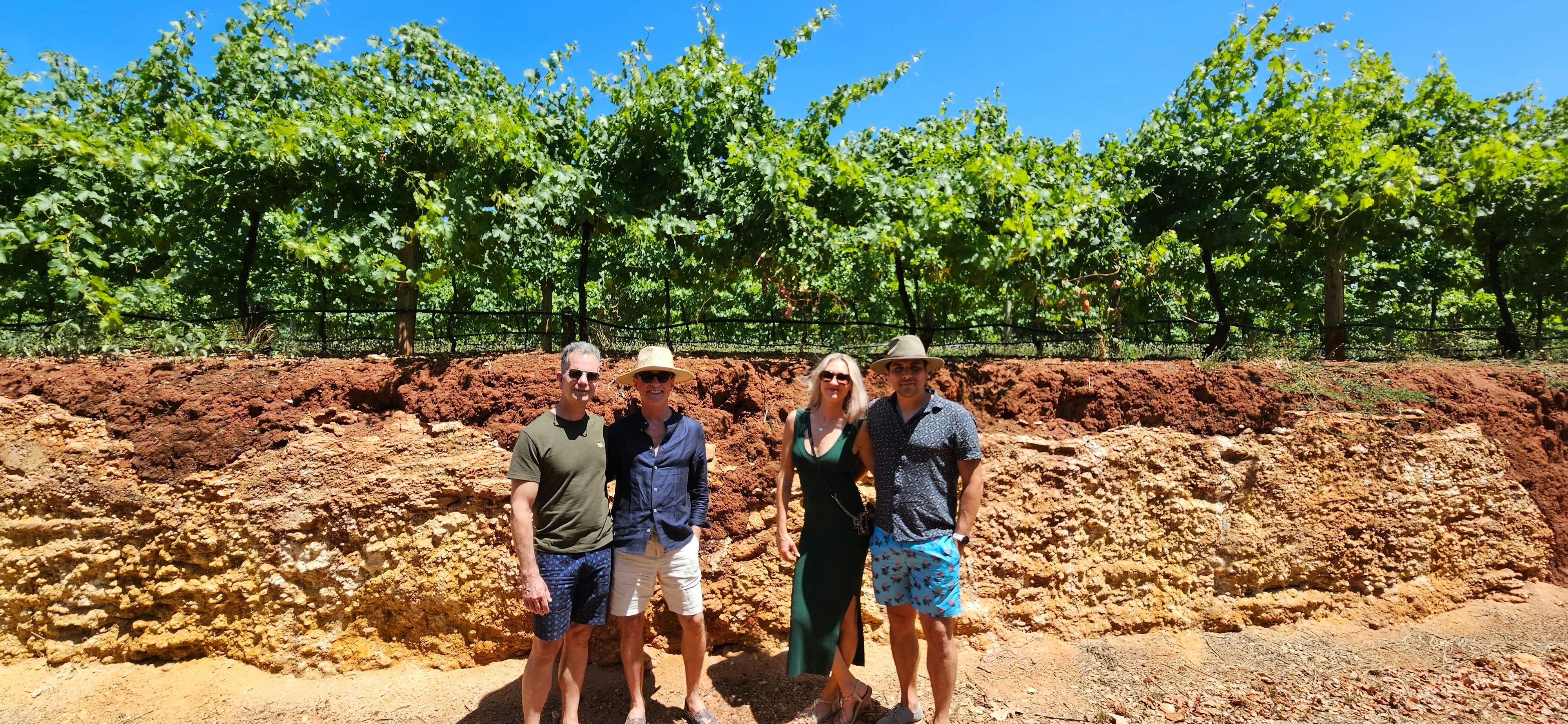 Coonawarra Experiences guests at the Terra Rossa soil profile in Coonawarra