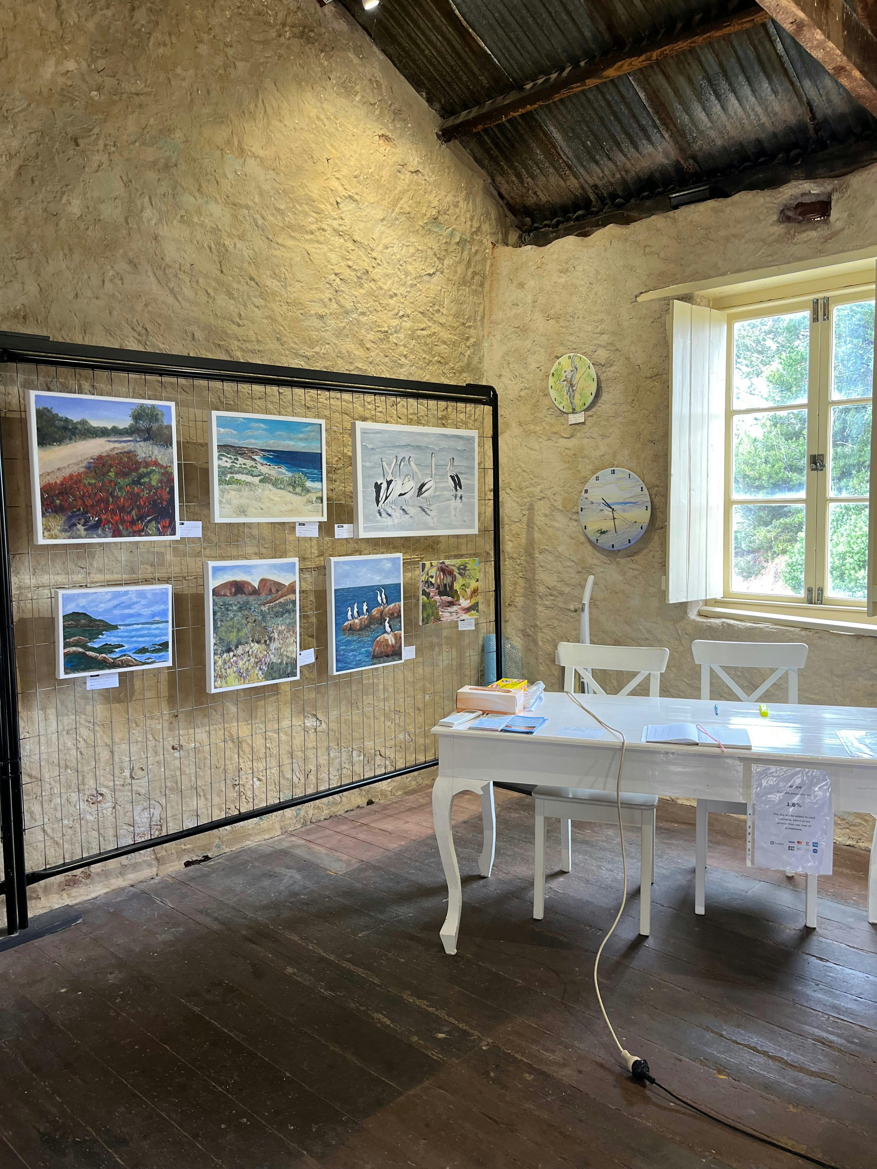 Local artists contribute paintings.