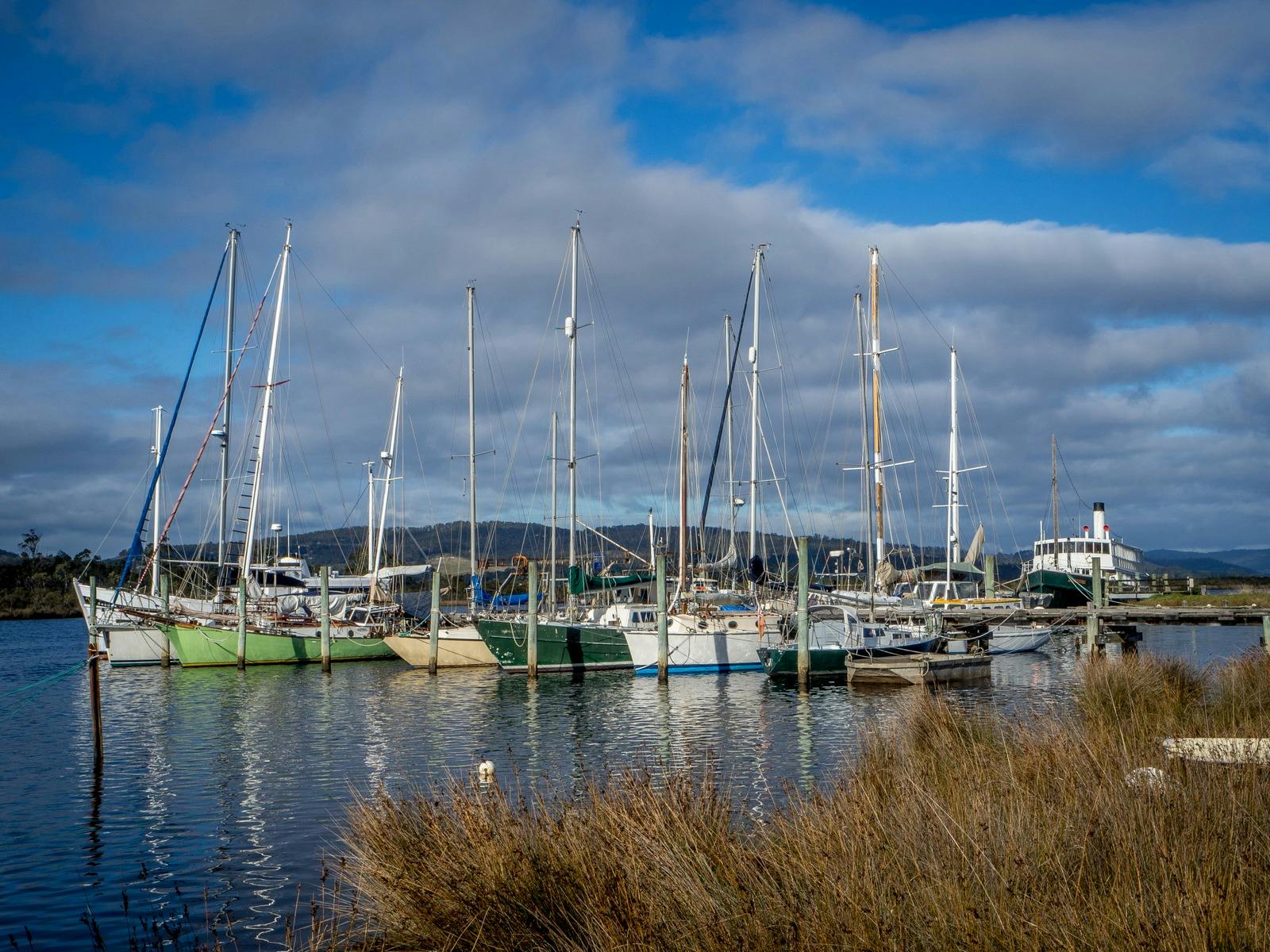 Boats moored at Franklin, on the Huon River in Southern Tasmania