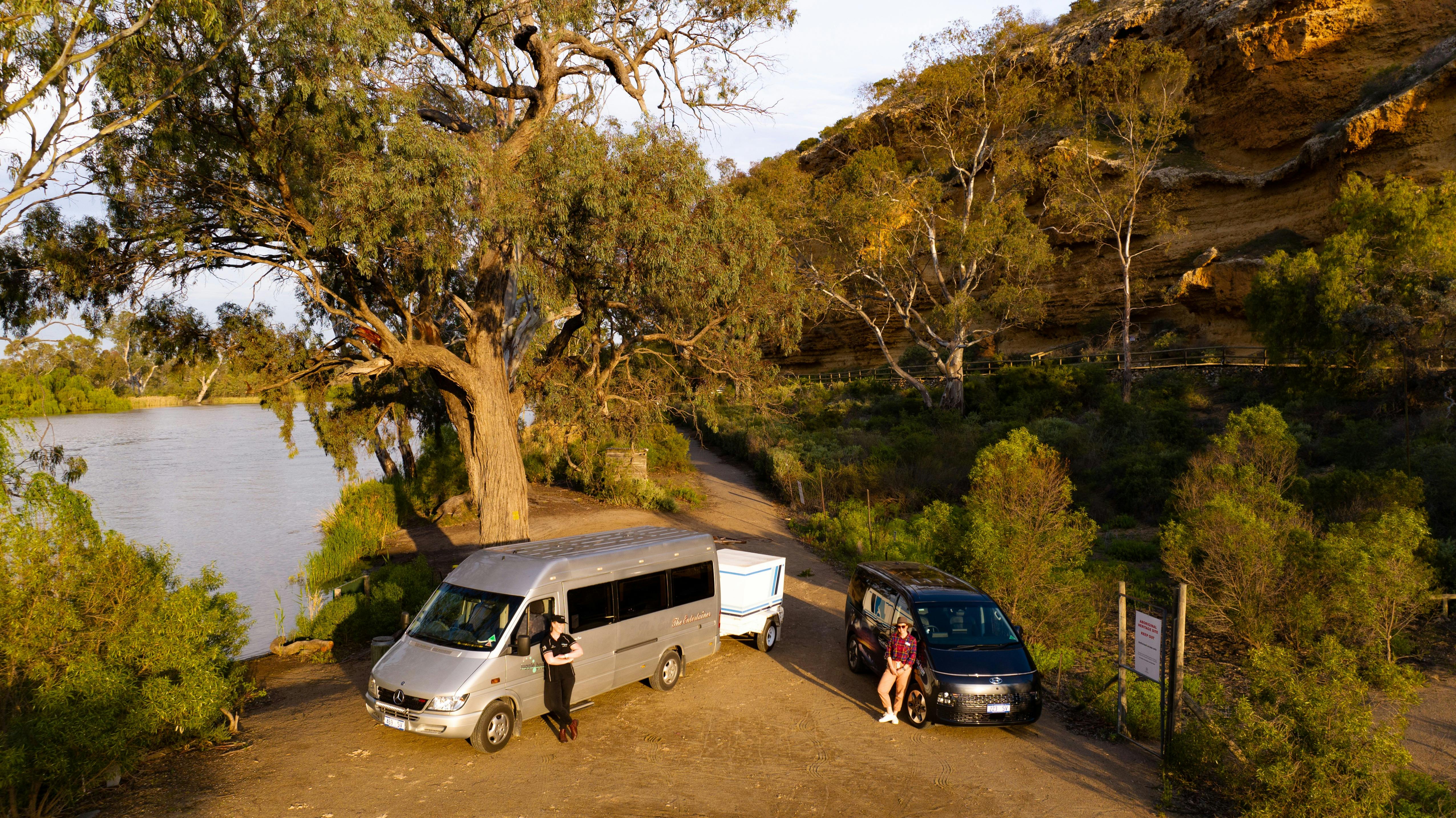 The Entertainer & Staria touring vehicles on the bank of the River Murray