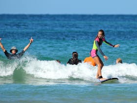 Coaches get as stoked as the participants with riding waves on the Coffs Coast