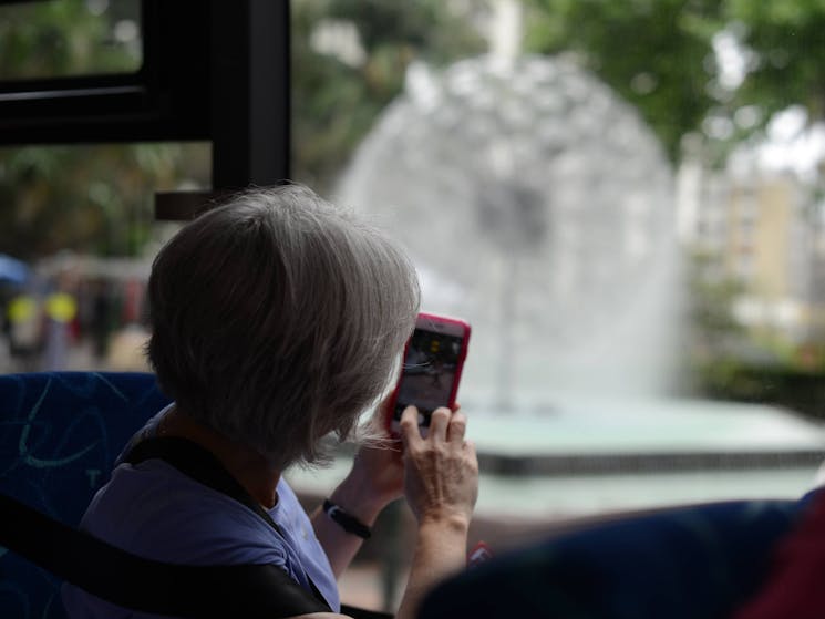 Sydney Bus Tours. A visitor enjoying Sydney sights.