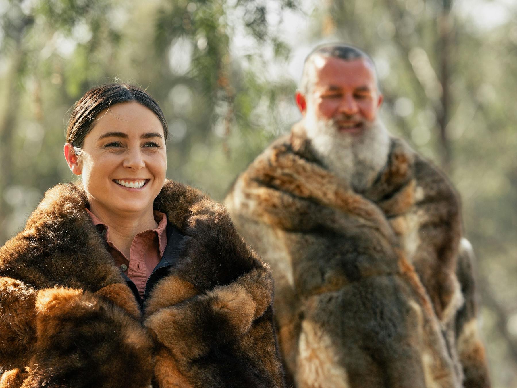 proud guides in possum skin cloaks