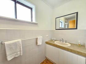 Main bathroom includes shower and a seperate toilet