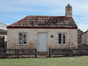 Historic limestone cottage exterior at 1856 Cottage accommodation in Robe South Australia