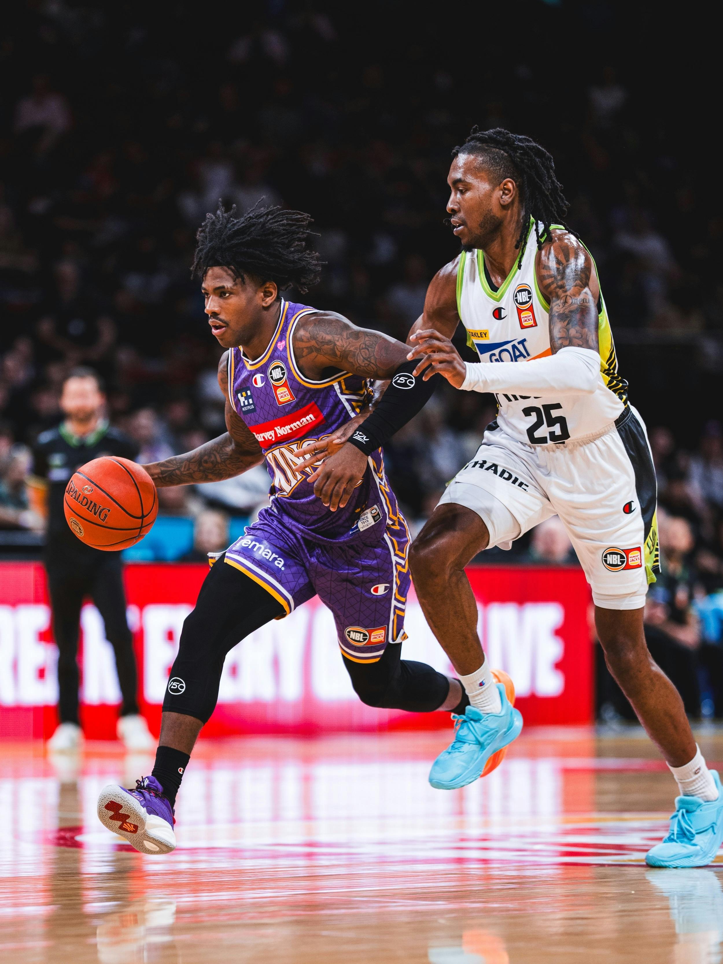 Kendric Davis with ball in game against S.E Melbourne Phoenix