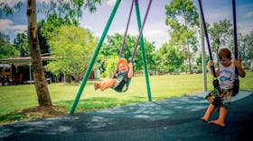 Children on swing at Theresa Creek Dam