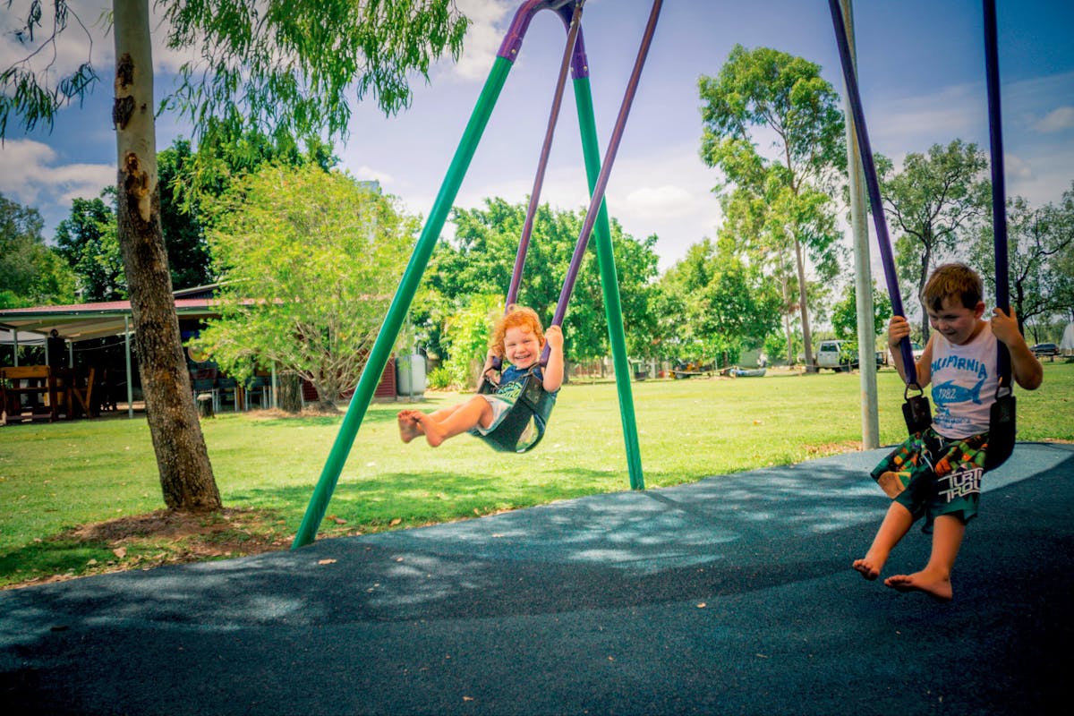 Children on swing at Theresa Creek Dam