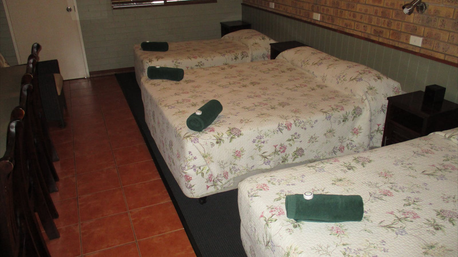 large room with queen and 2 singles