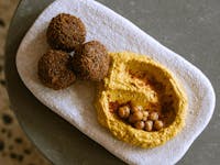 Traditional felafel, green pea hummus
