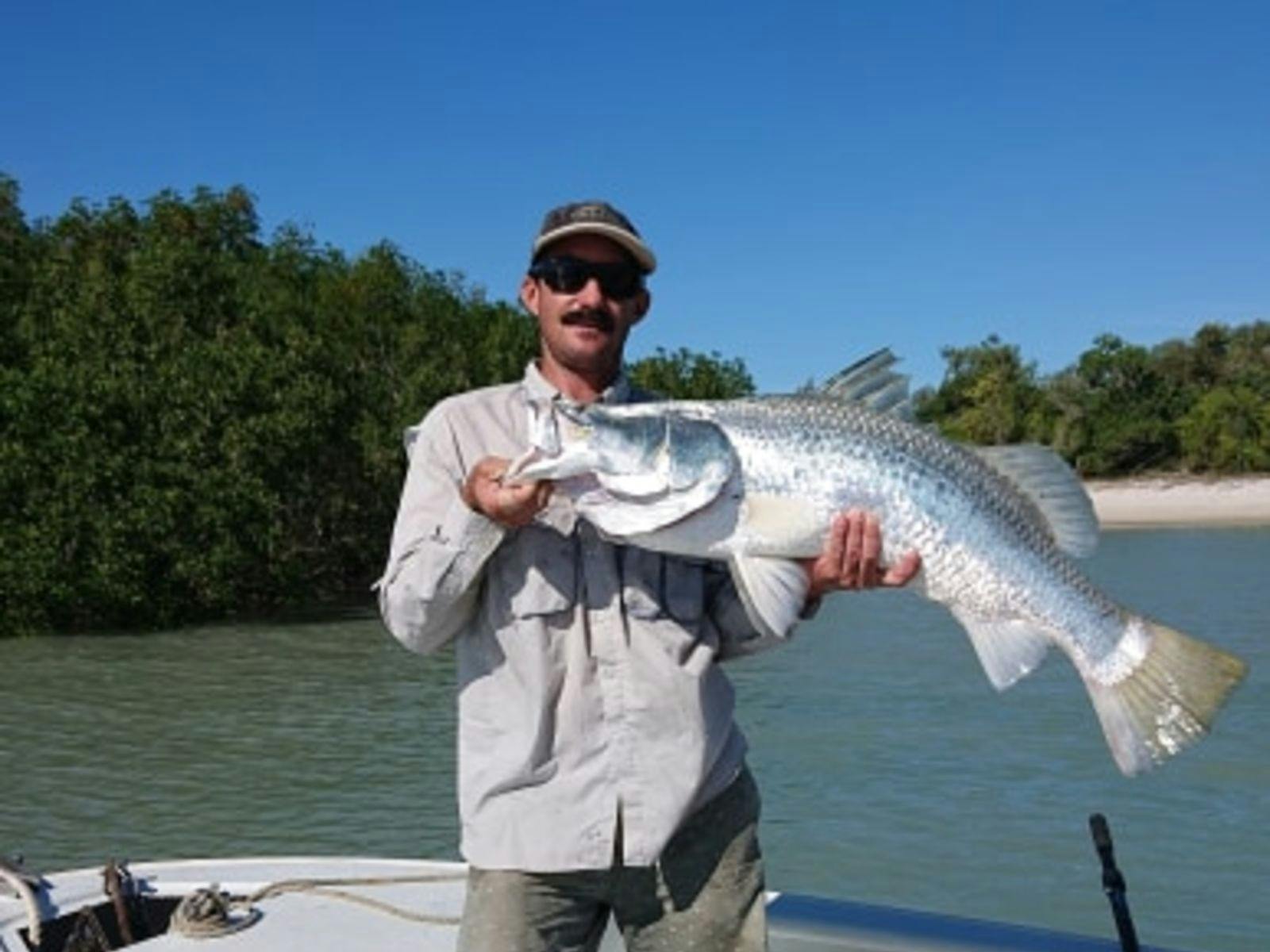 Australian Sportfishing Charters guide with a beautiful Barramundi fish