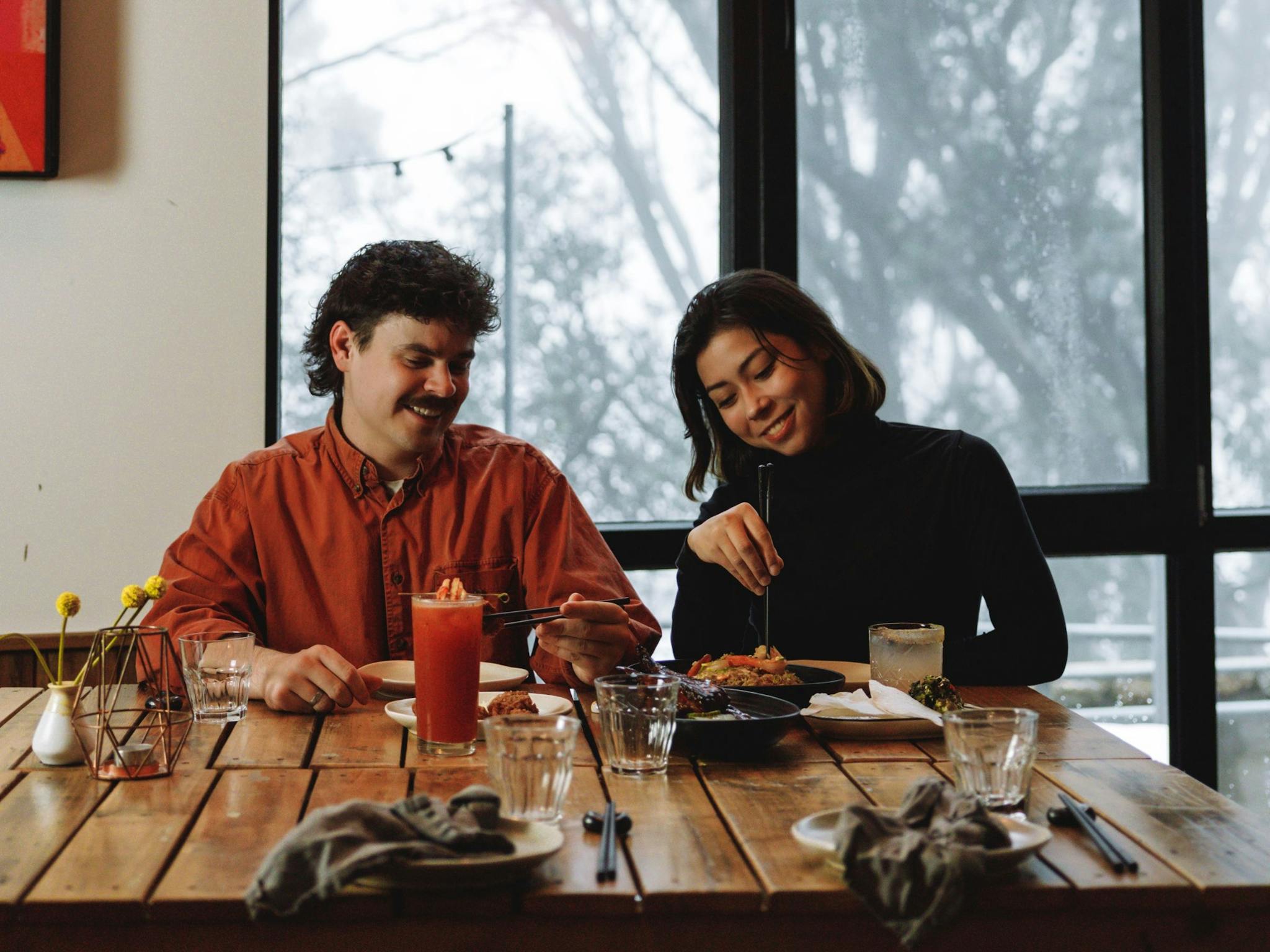 A couple enjoying dinner at Huski Kitchen