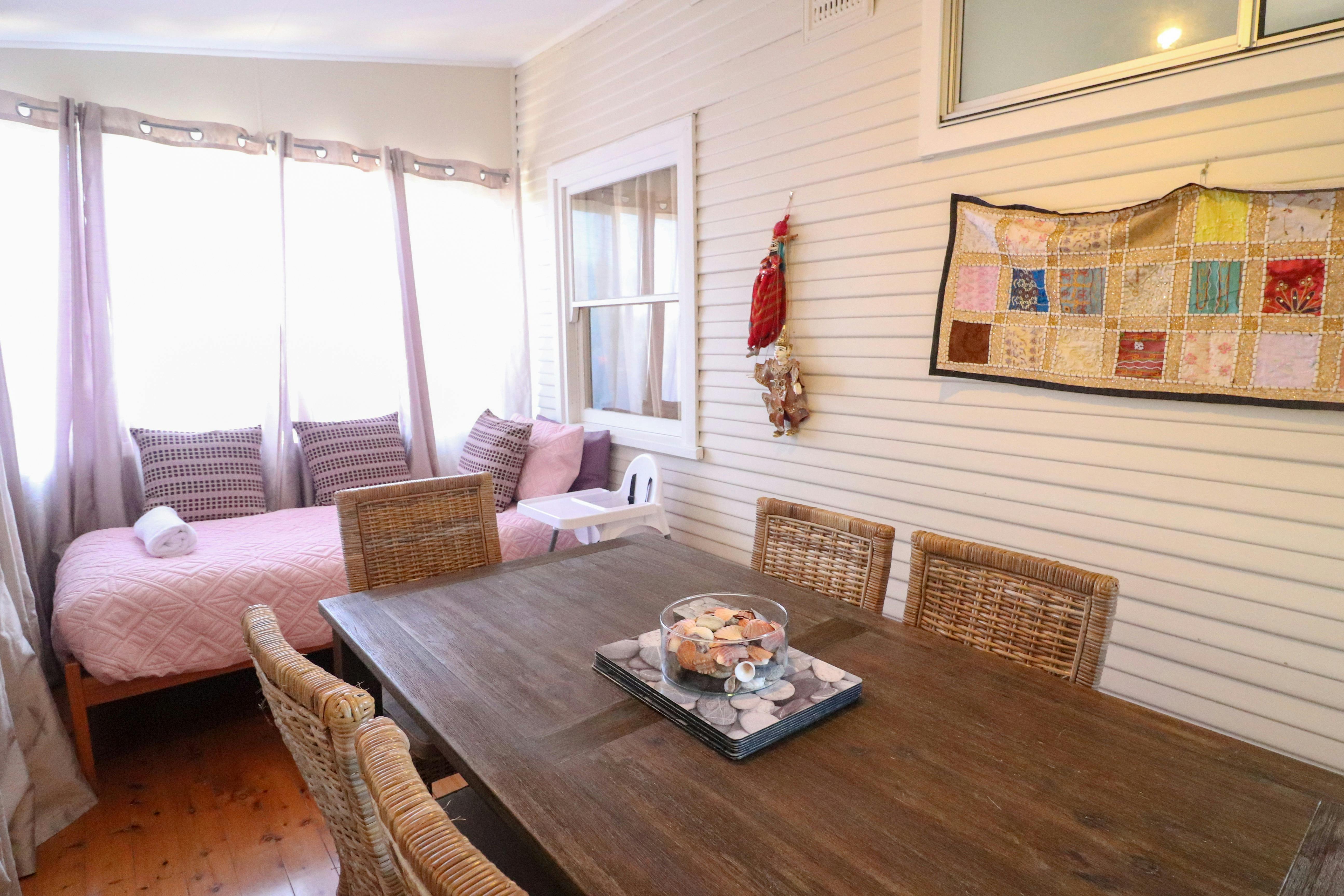 Dining room and single bed