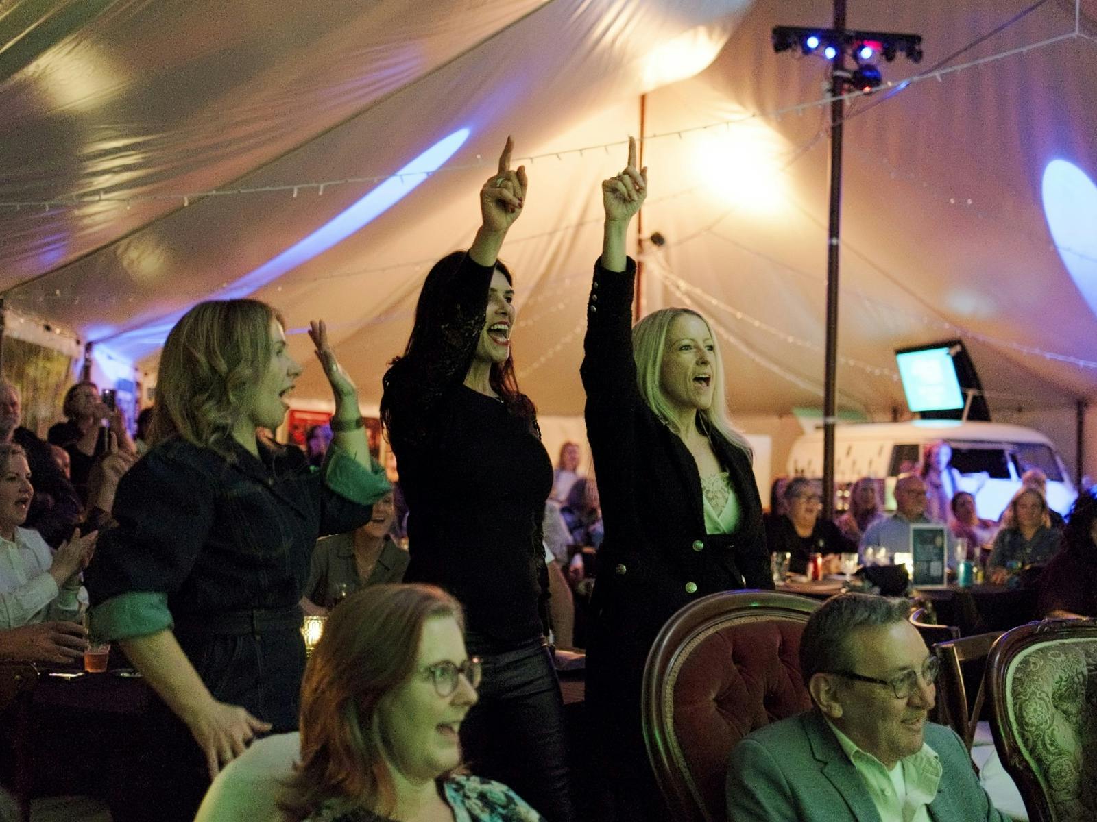 ladies standing up and dancing