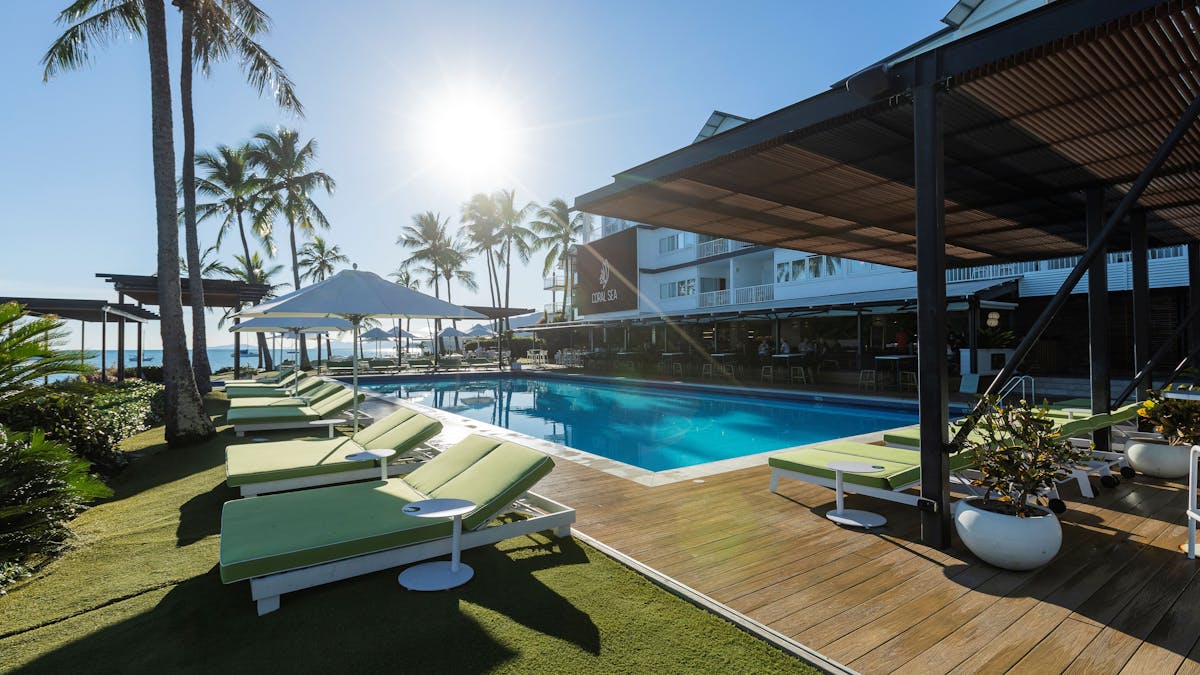 coral sea resort lounge chairs on the pool deck