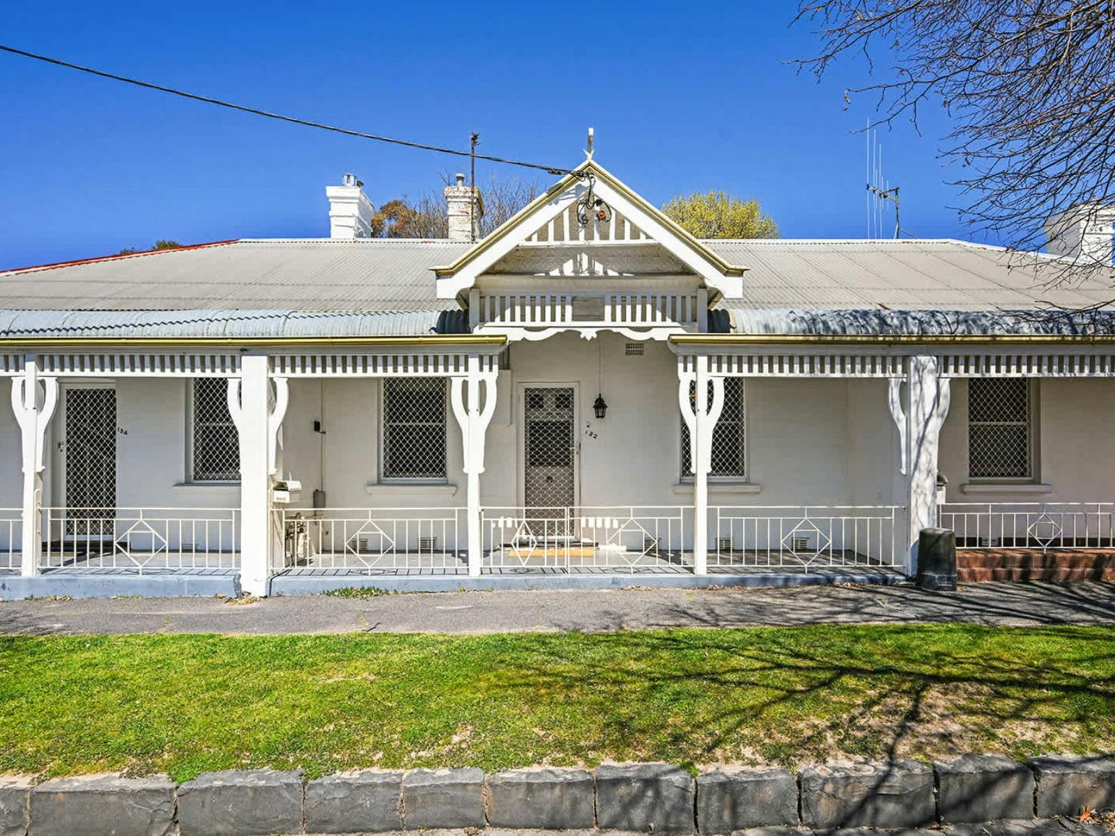 White front with a fence