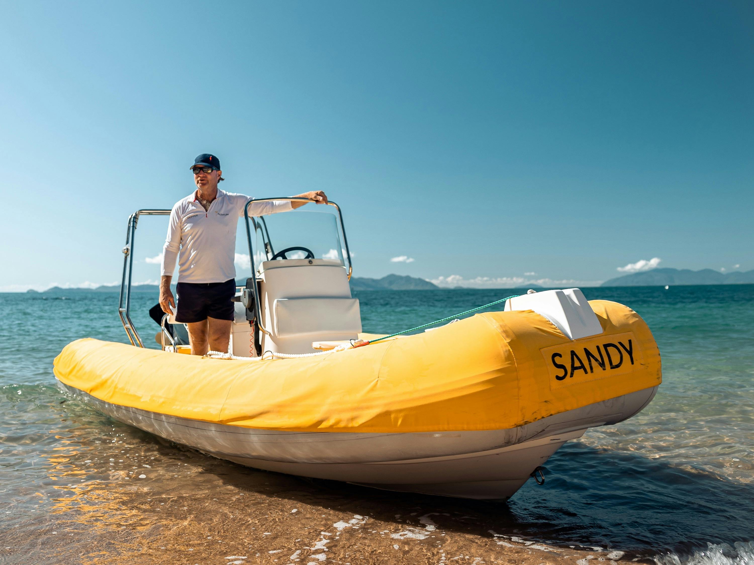 Yellow 5.5 m RIB (vessel) and skipper
