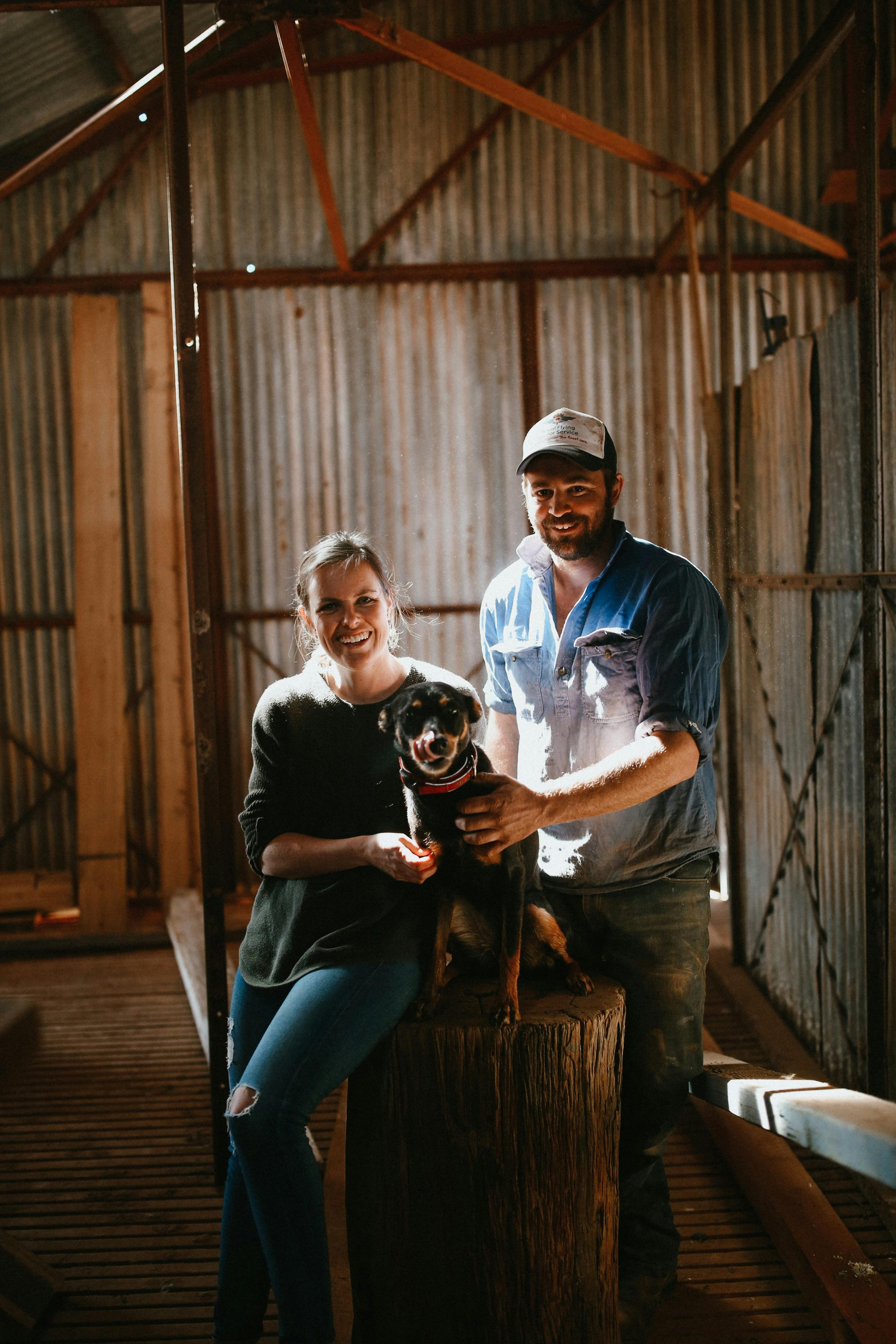 Maddy, Tom and dog Tilly in old workshop.