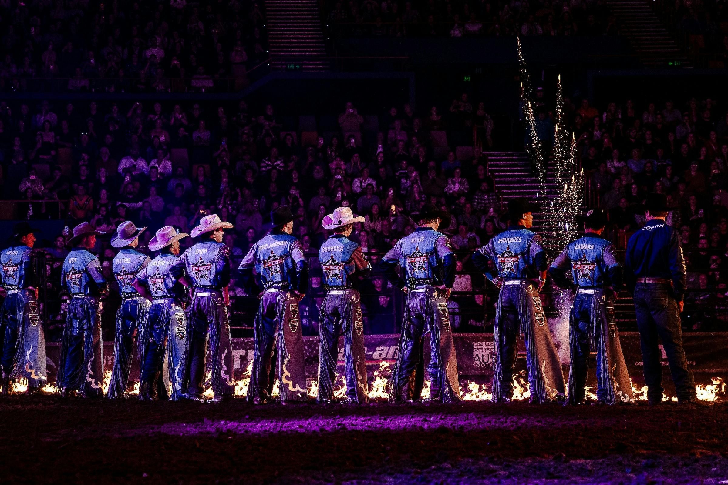 PBR cowboys in arena