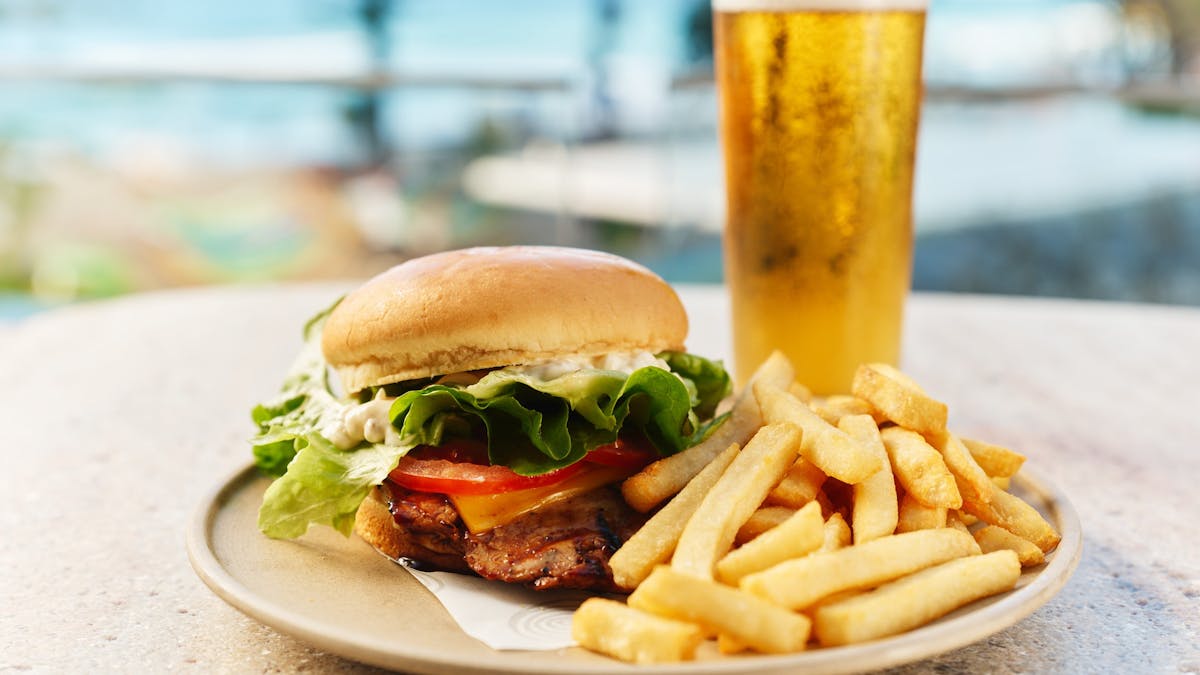 Hurricane's Surfers Paradise - Beef Burger, Chips & Beer On A Plate With Ocean View.