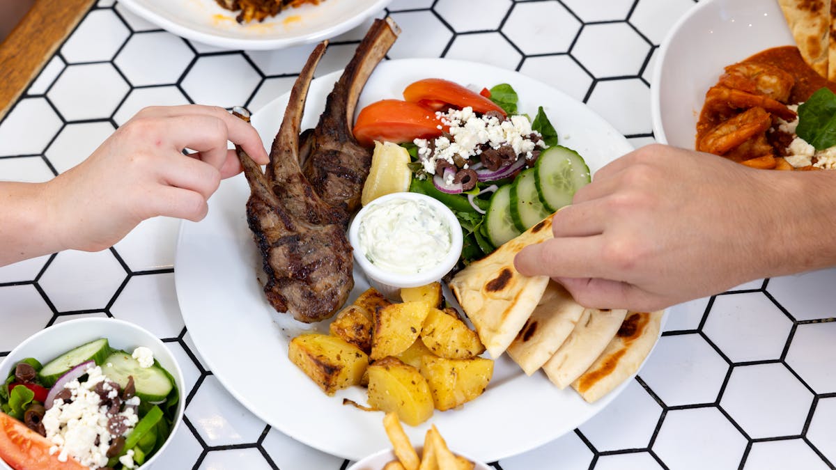Birds-eye-view of Greek share plate at Soul Boardwalk