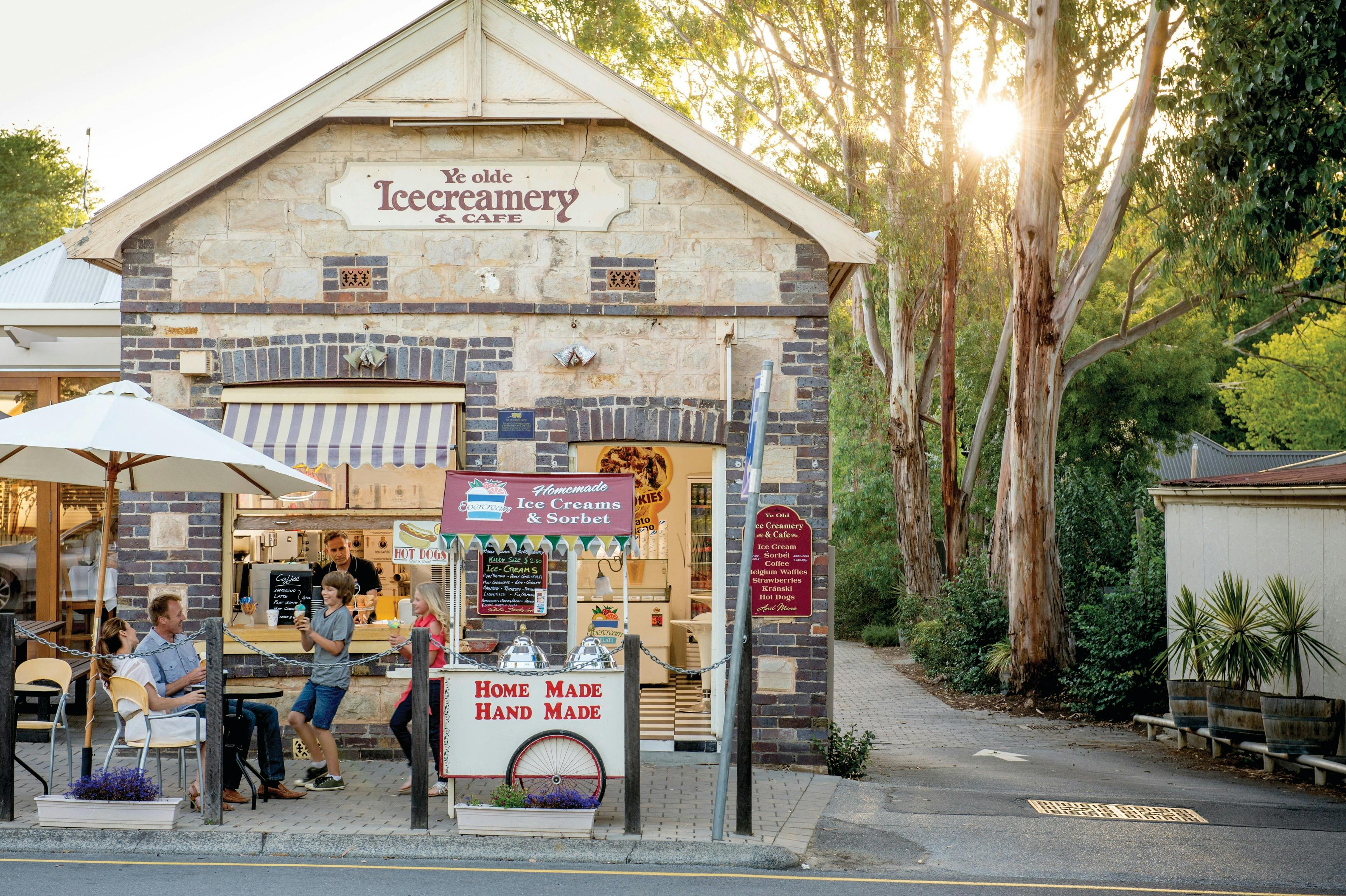 people walking past an ice creamery in Hahndorf