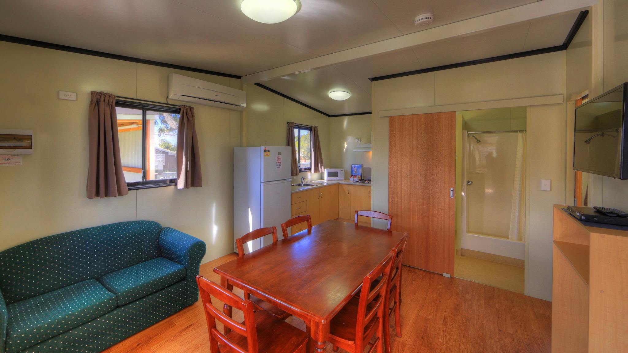 Living/Dining/Kitchenette Area in 2 Bedroom Cabin 6 Berth at BIG4 Toowoomba Living/Dining/Kitchenette Area in 2 Bedroom Cabin 6 Berth at BIG4 Toowoomba