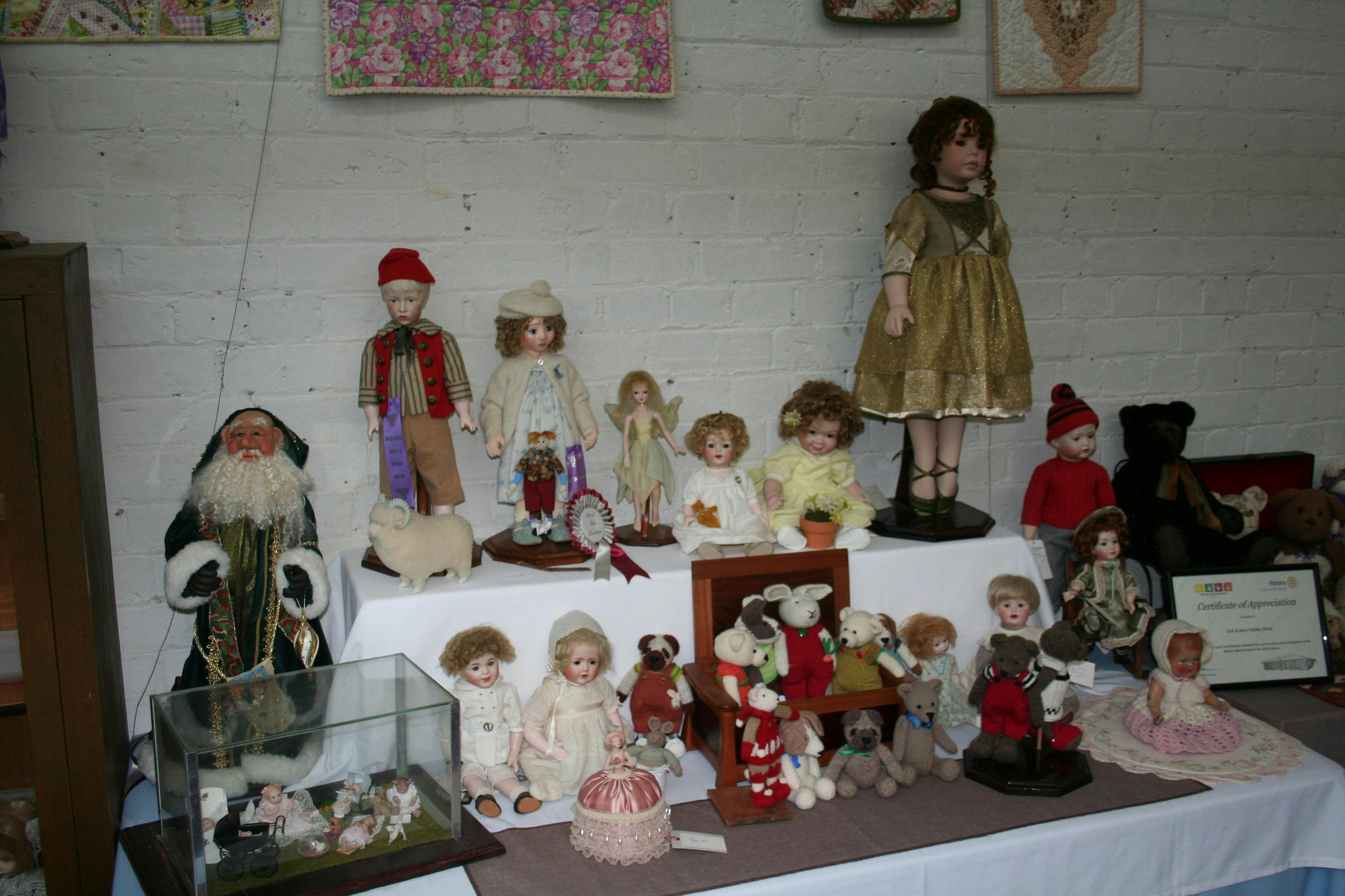 A display of antique reproduction dolls
