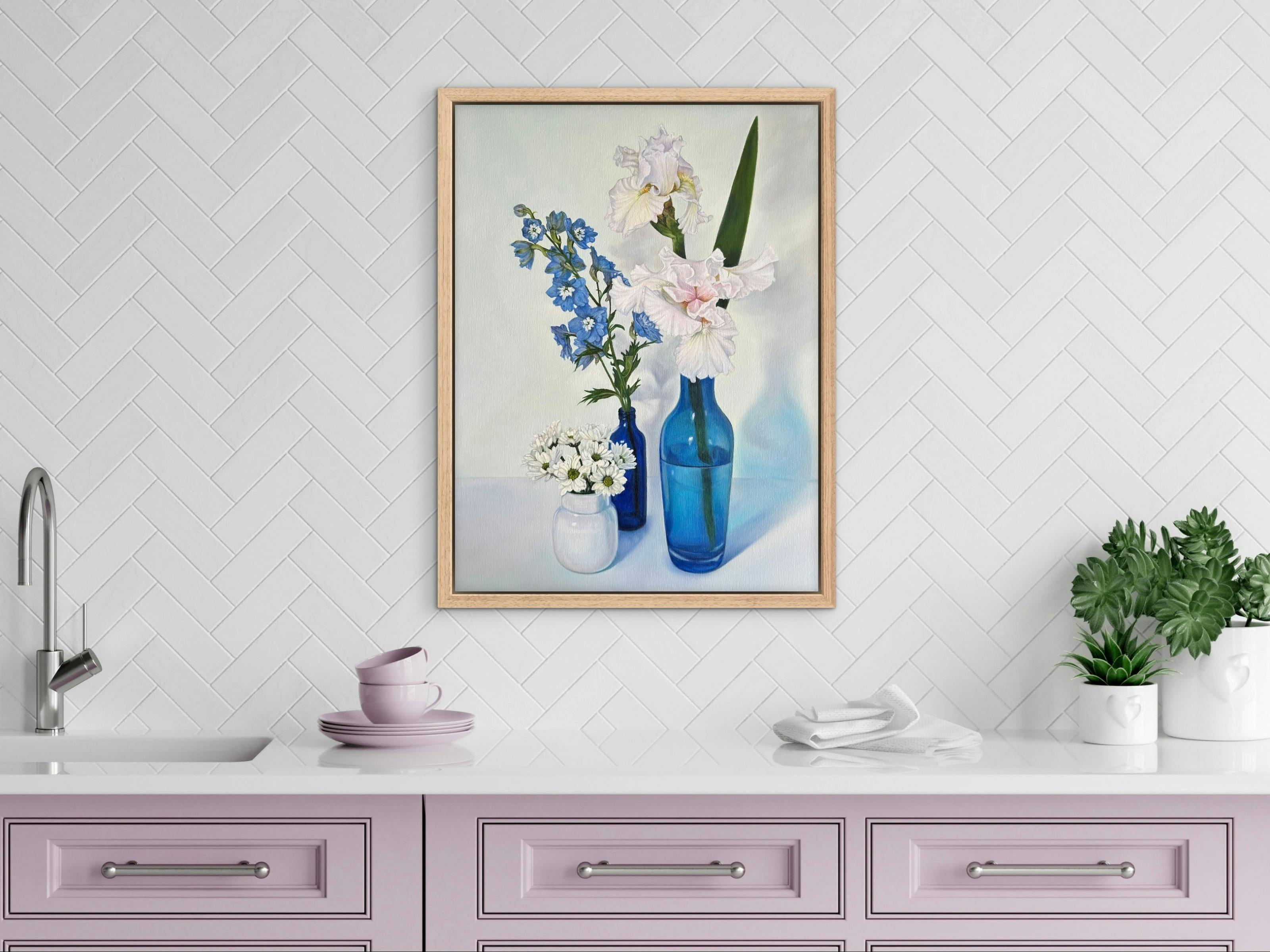 Floral oil painting on white background in pink kitchen