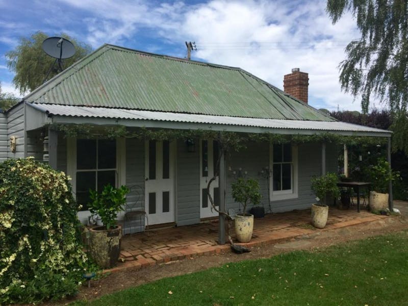 Heritage Cottage, Green tin roof, chimney, garden, pot plants
