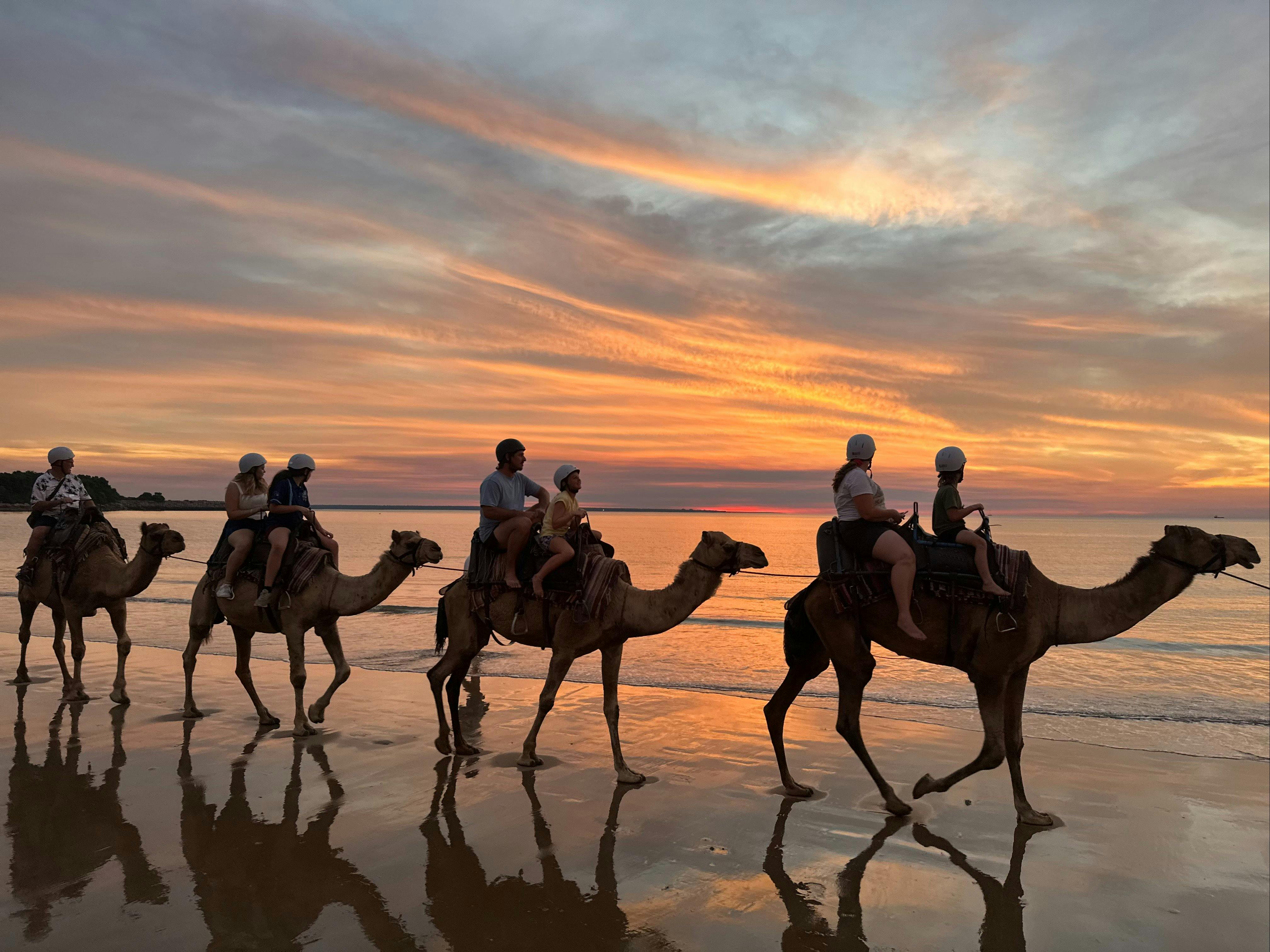 Sunset Camel Ride With all the colours of the sunset
