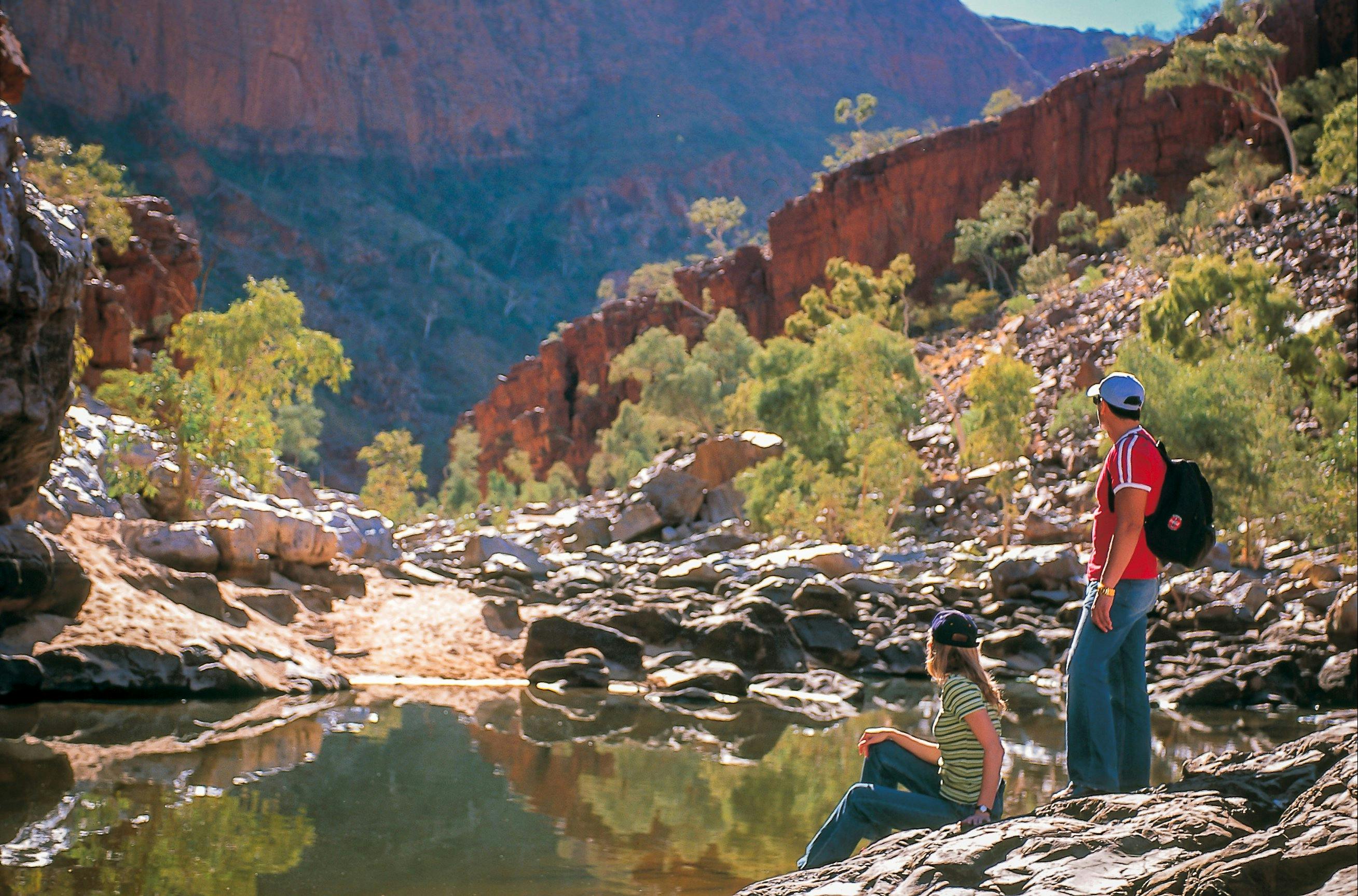 A couple looking through Ormiston Gorge