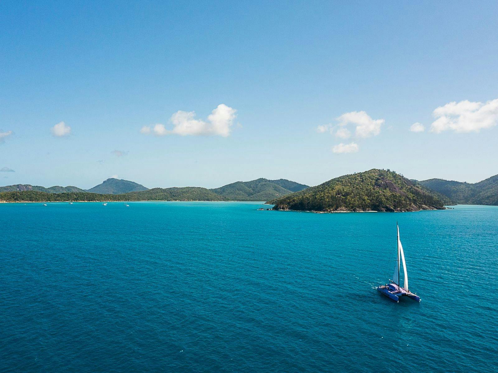 Aerial view of Camira sailing around the Whitsunday Islands