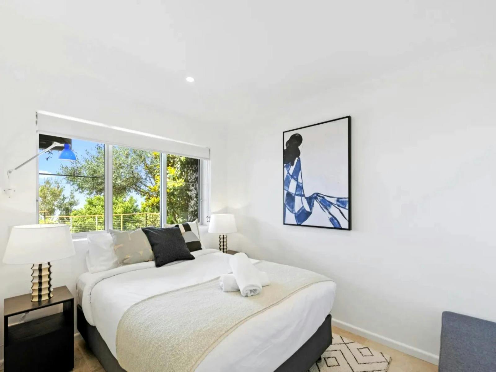 A stylish queen bedroom