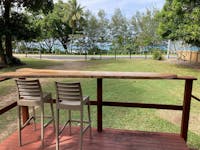 Looking at the ocean across the road from your Sea View Bungalow at Bali Hai Child Free Holiday Park