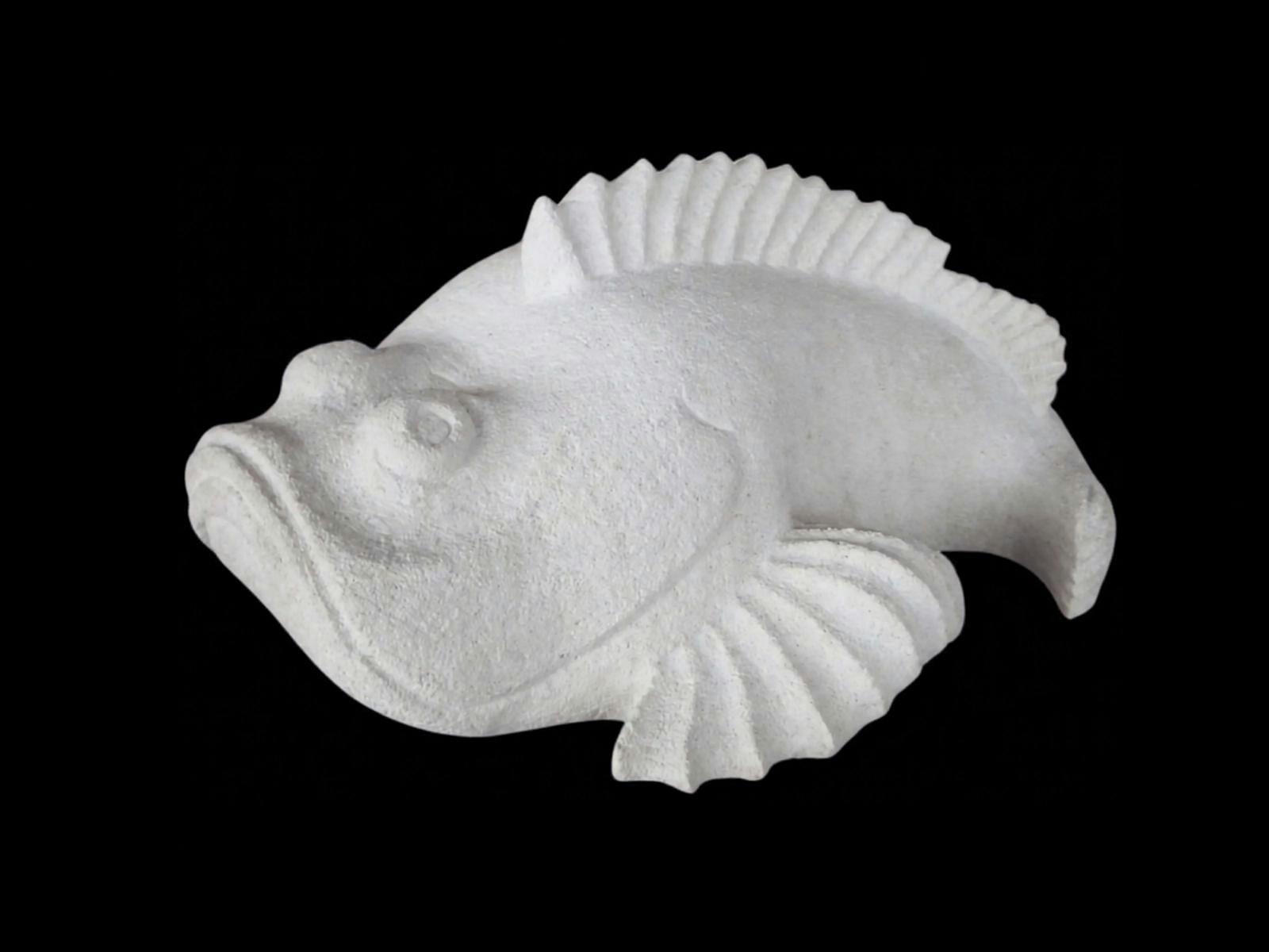Limestone carved fish