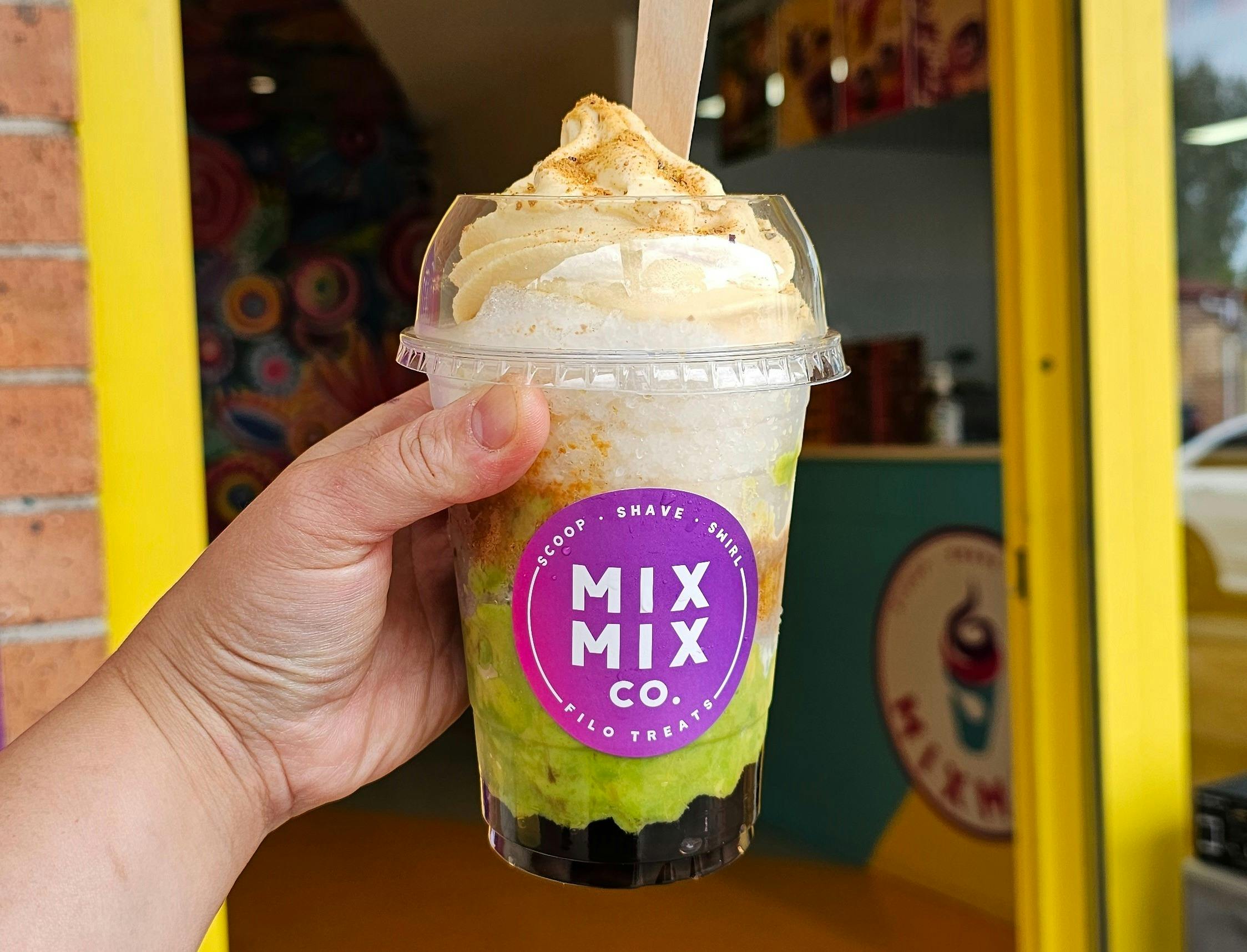 Mix Mix Co. - someone holding a drink