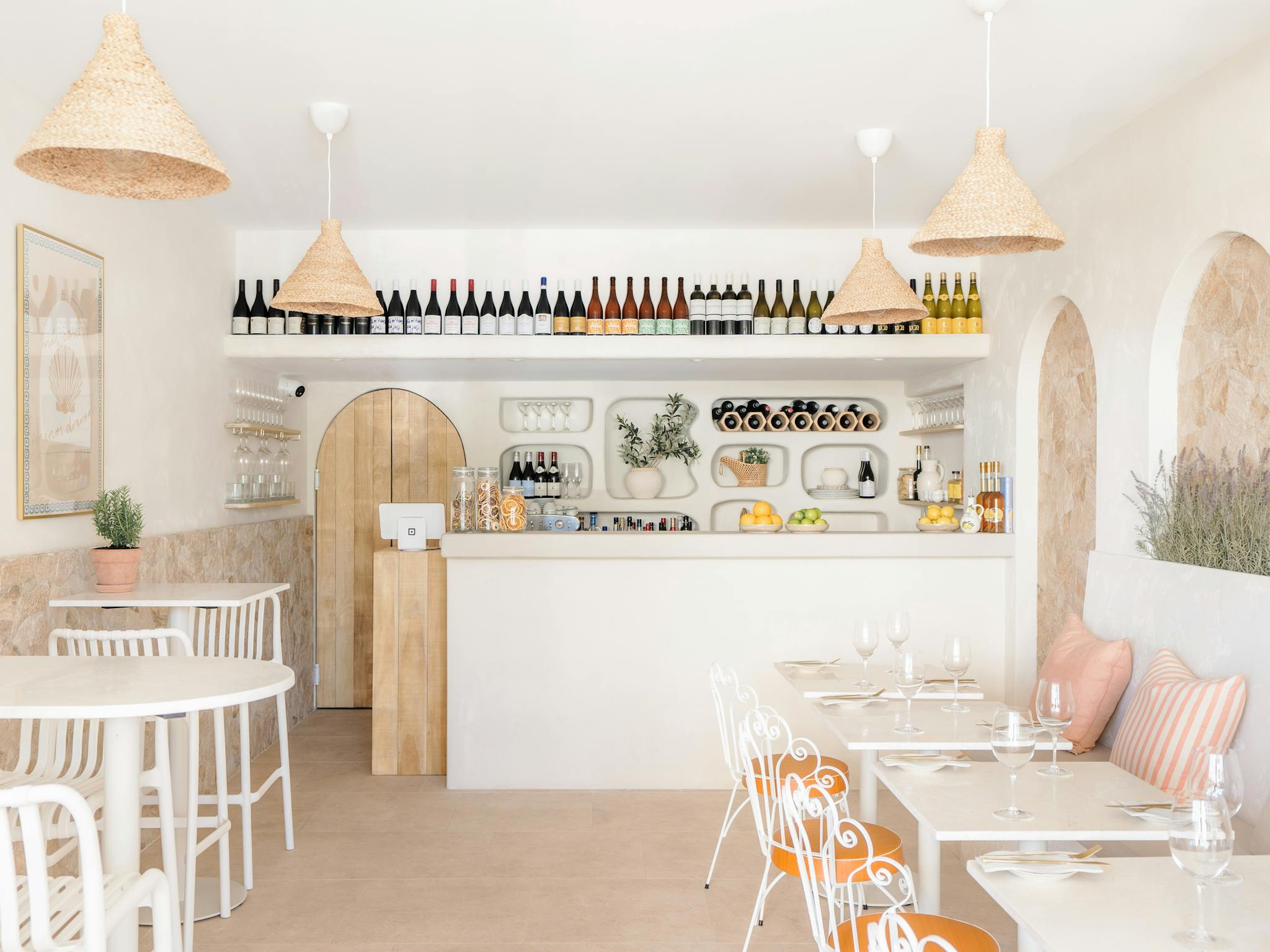 Interior of Casita Wine Bar near Mooloolaba Beach, featuring Mediterranean coastal design with soft Interior of Casita Wine Bar near Mooloolaba Beach, featuring Mediterranean coastal design with soft