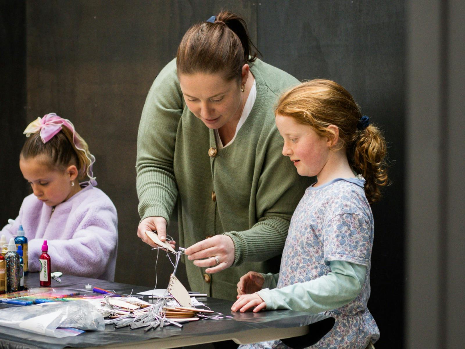 Children enjoying the craft area at Twilight Market in St Helens.