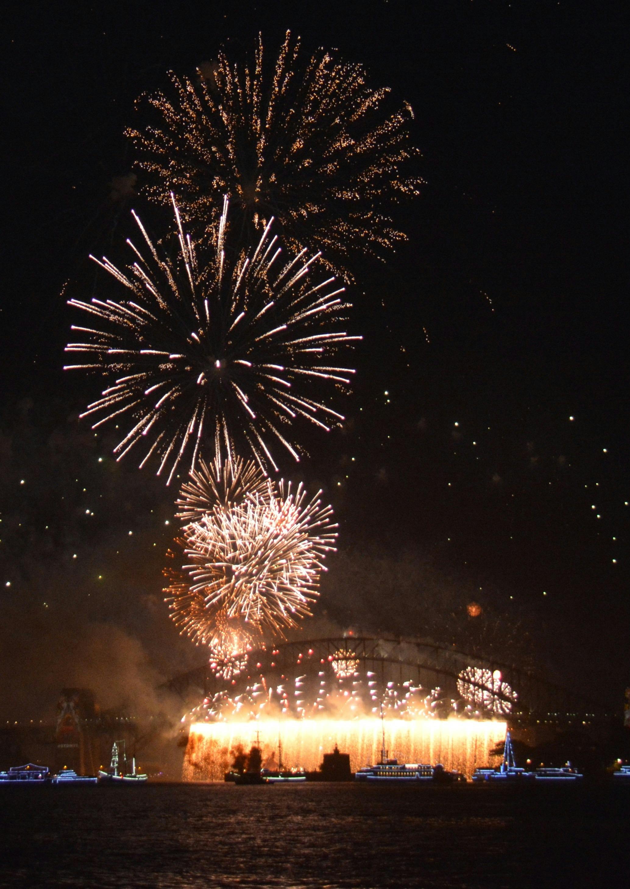 A waterfall of golden fireworks from the harbour bridge