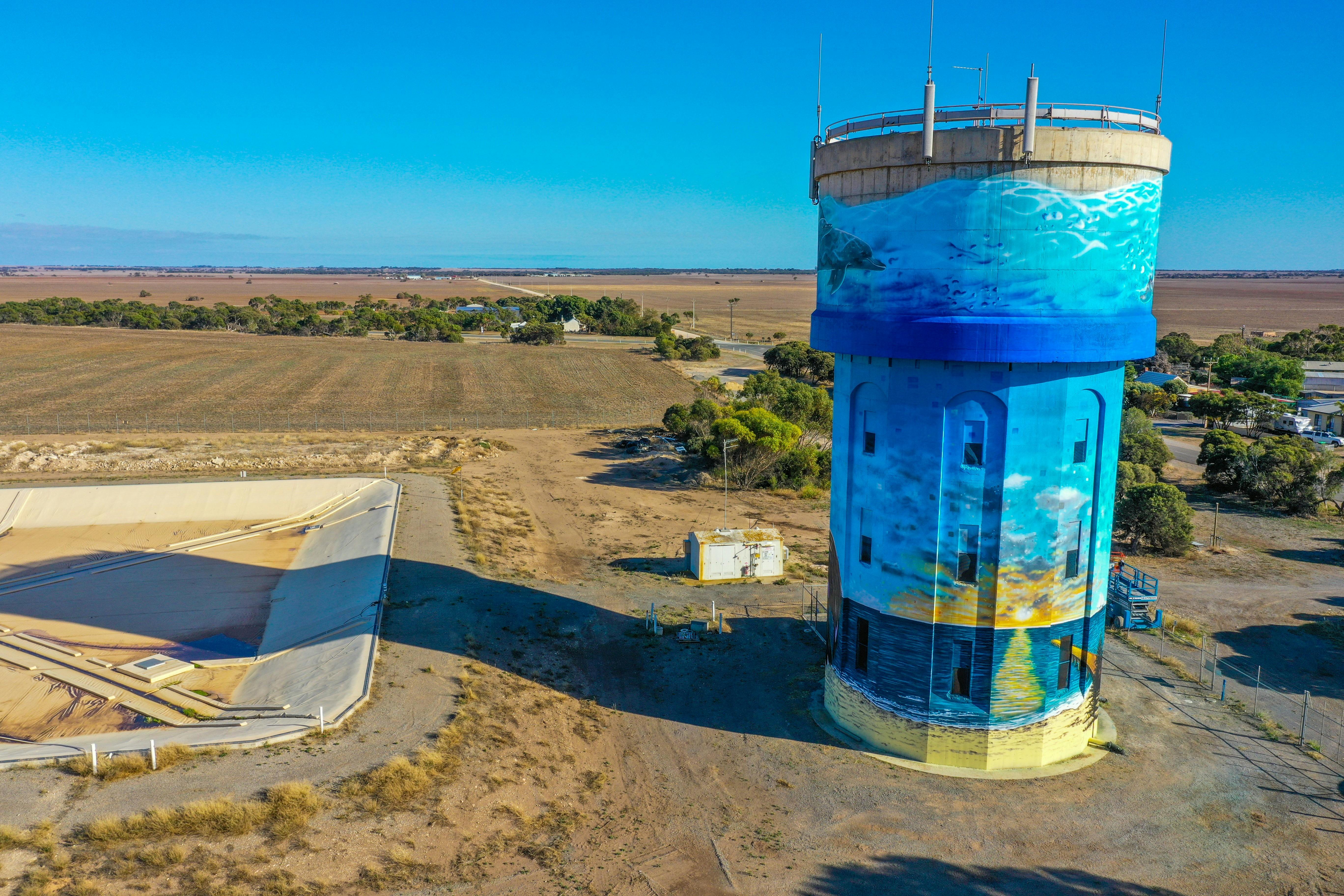 Stansbury Water Tower. Golden path and blue skies.