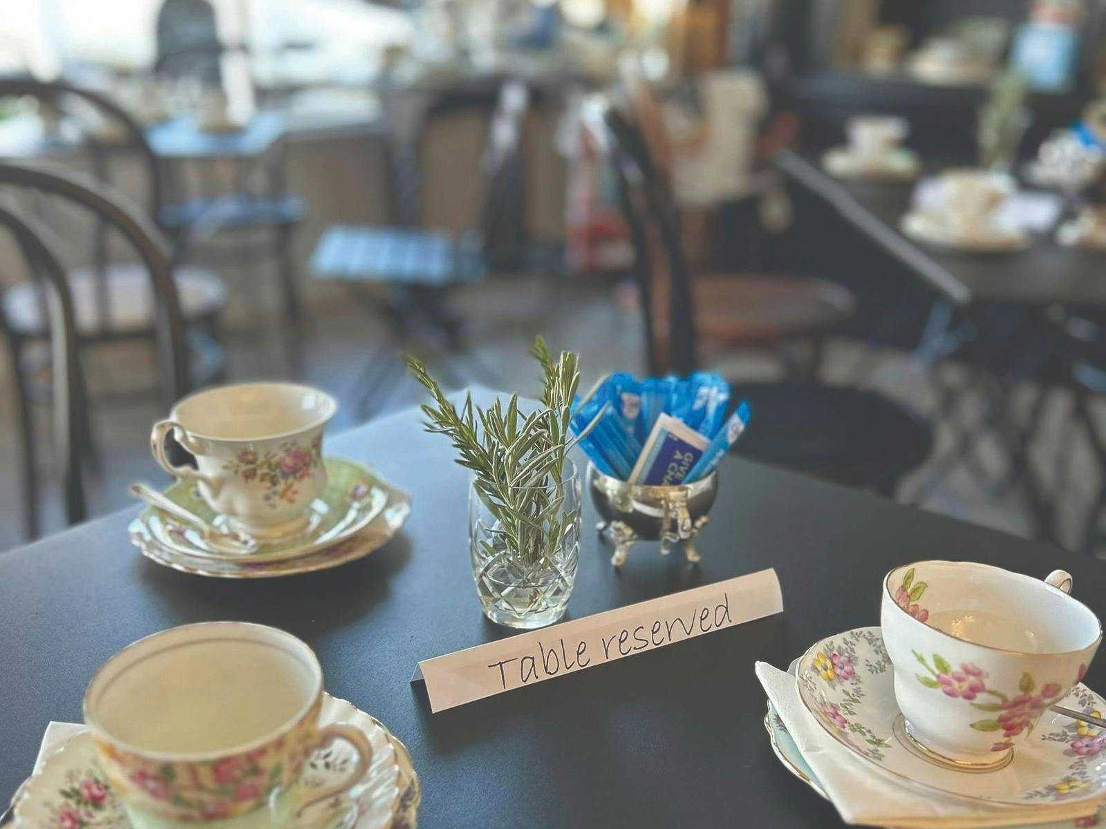 Reserved table with tea cups