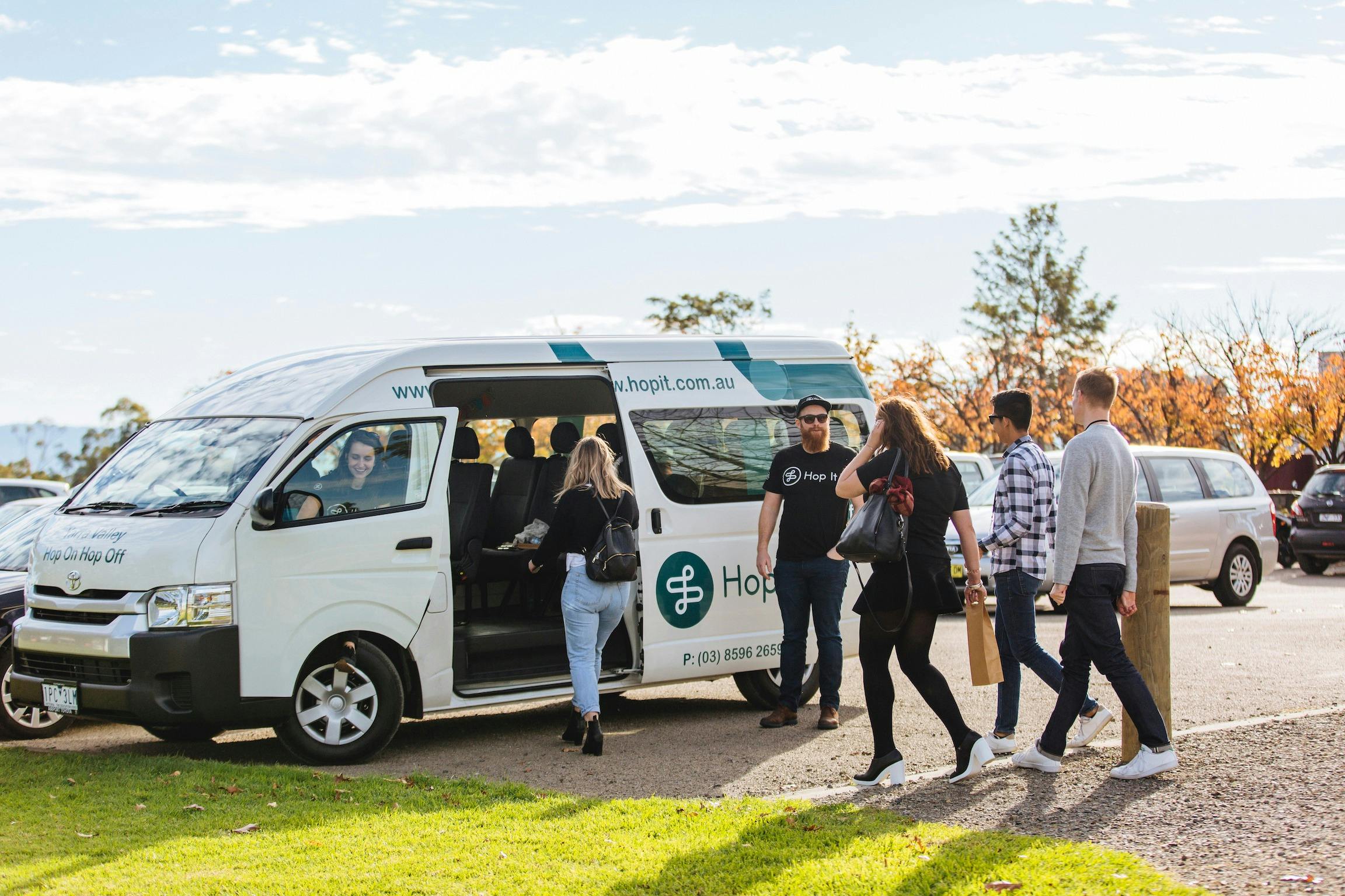guests boarding Hop It bus