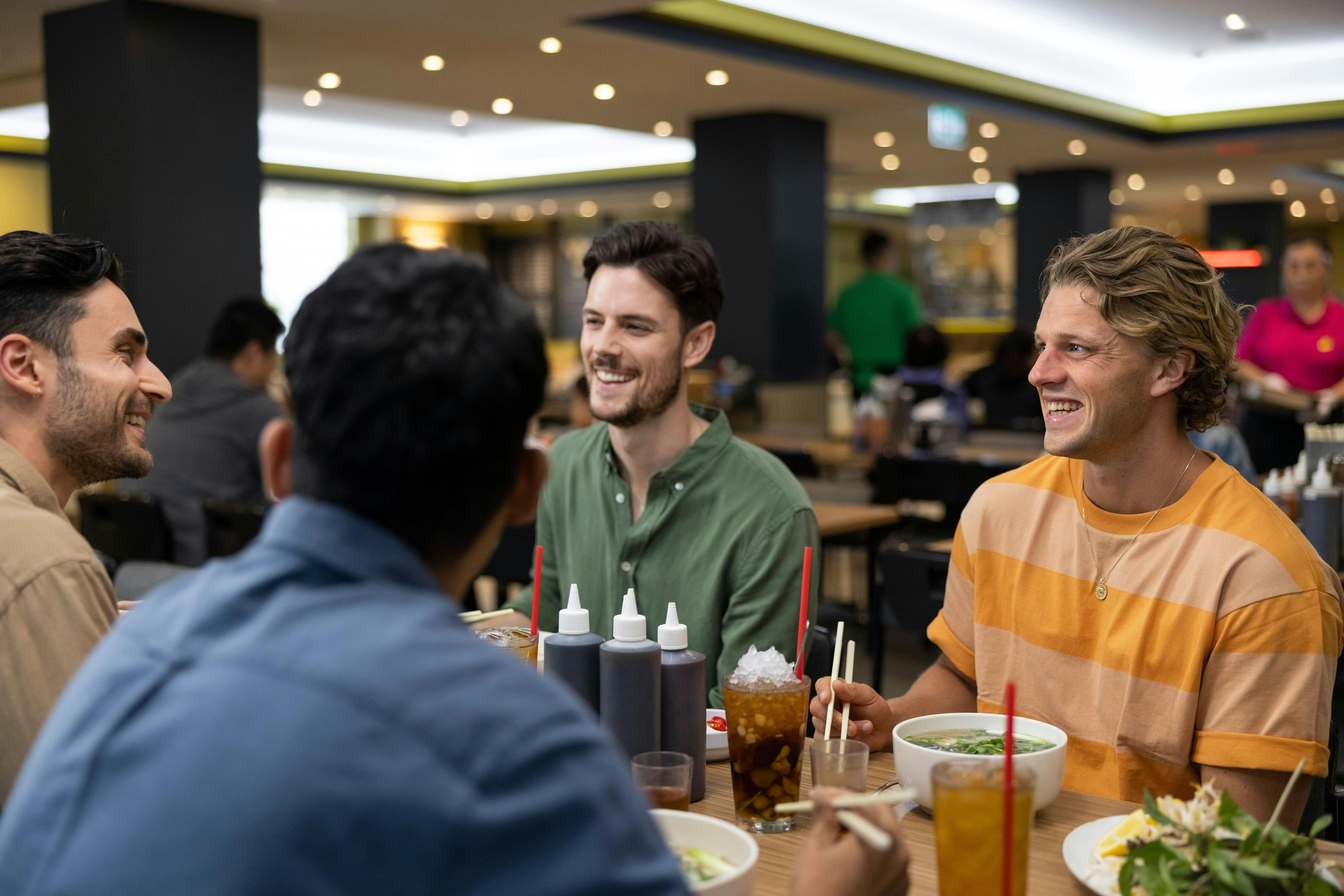 Diners with drinks and pho at An in Bankstown