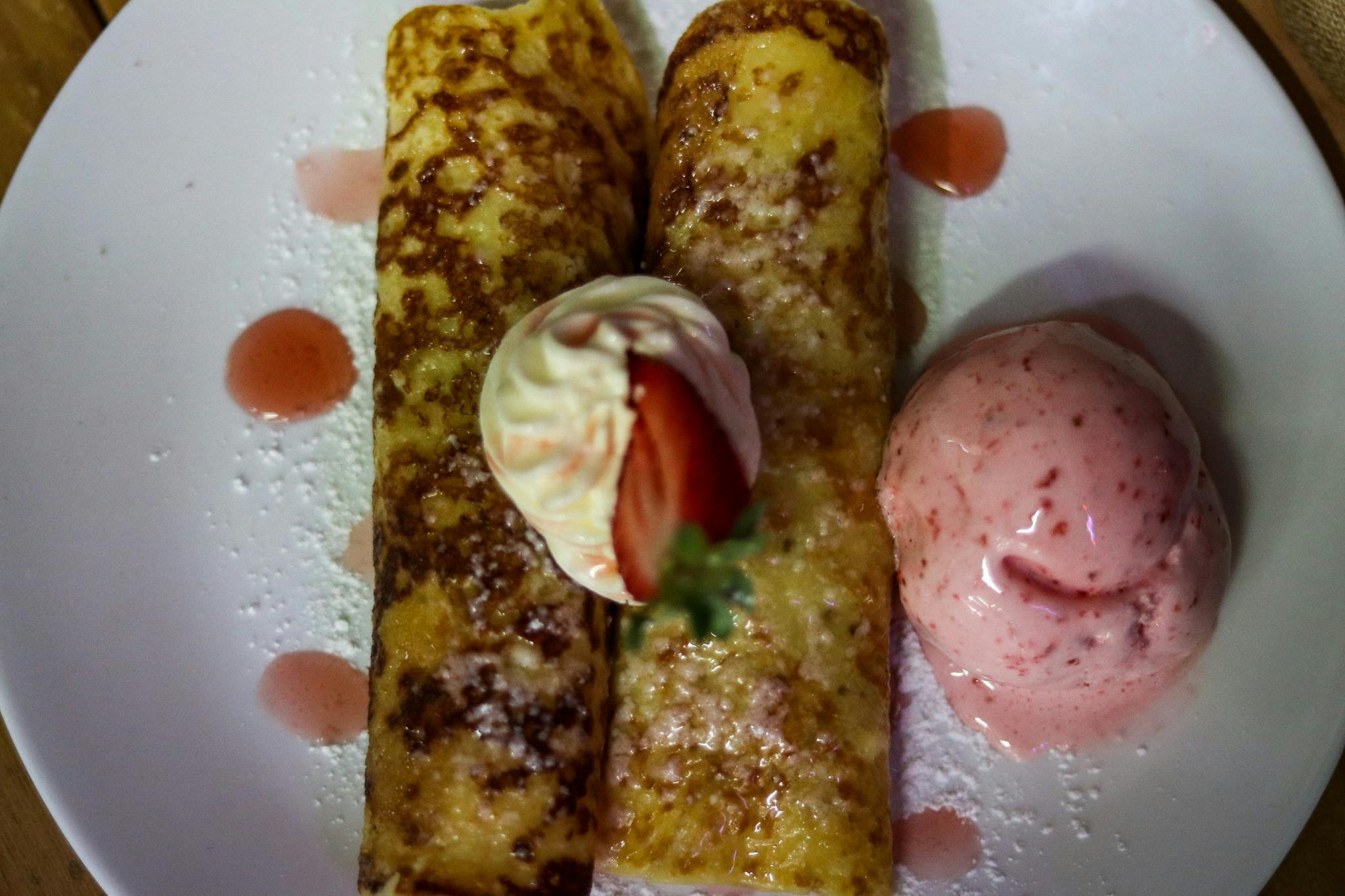 Pancakes with strawberries and strawberry icecream