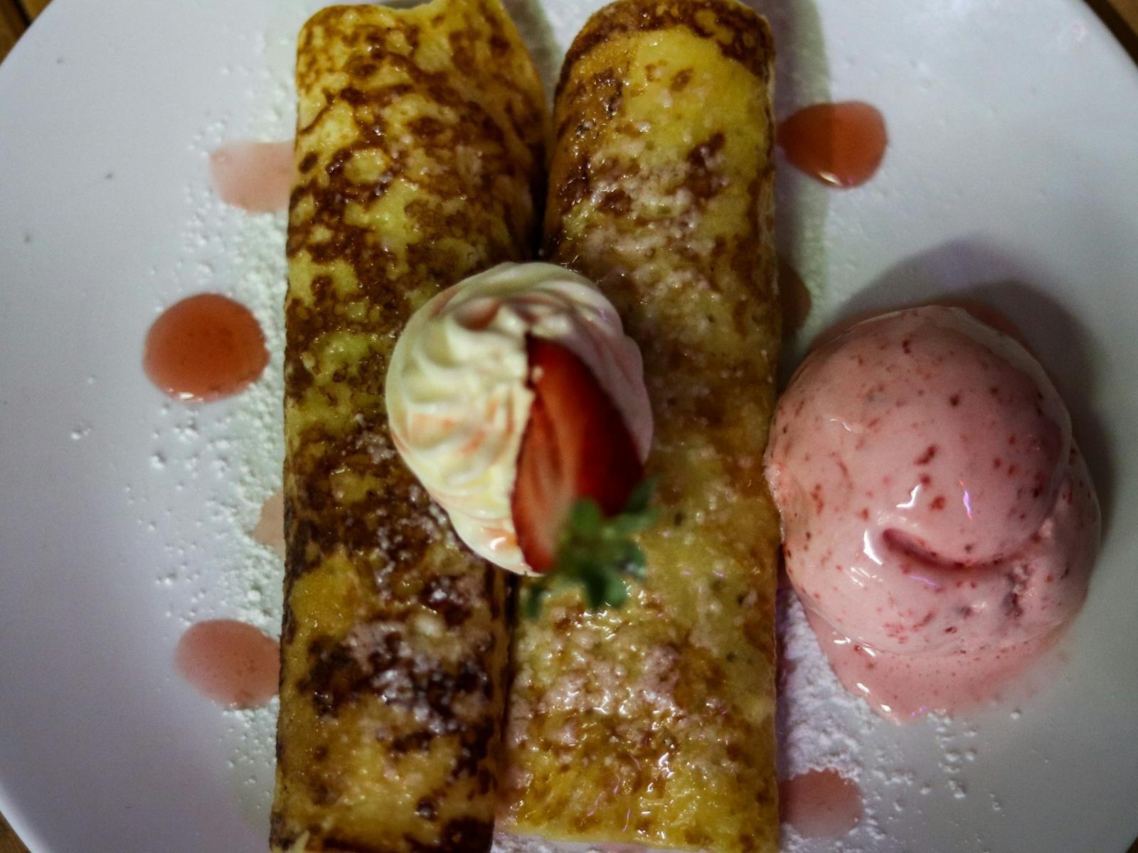 Pancakes with strawberries and strawberry icecream