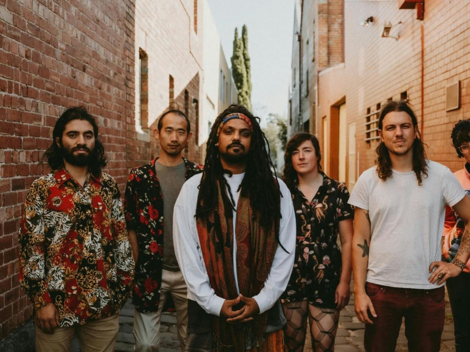 Press shot of Firetail electro-jazz fusions ensemble standing in a laneway