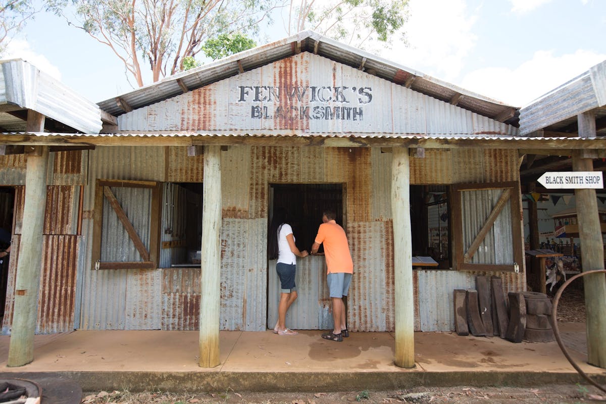 A couple look in a display at the Mareeba Heritage Museum in Mareeba, Tropical North Qld.