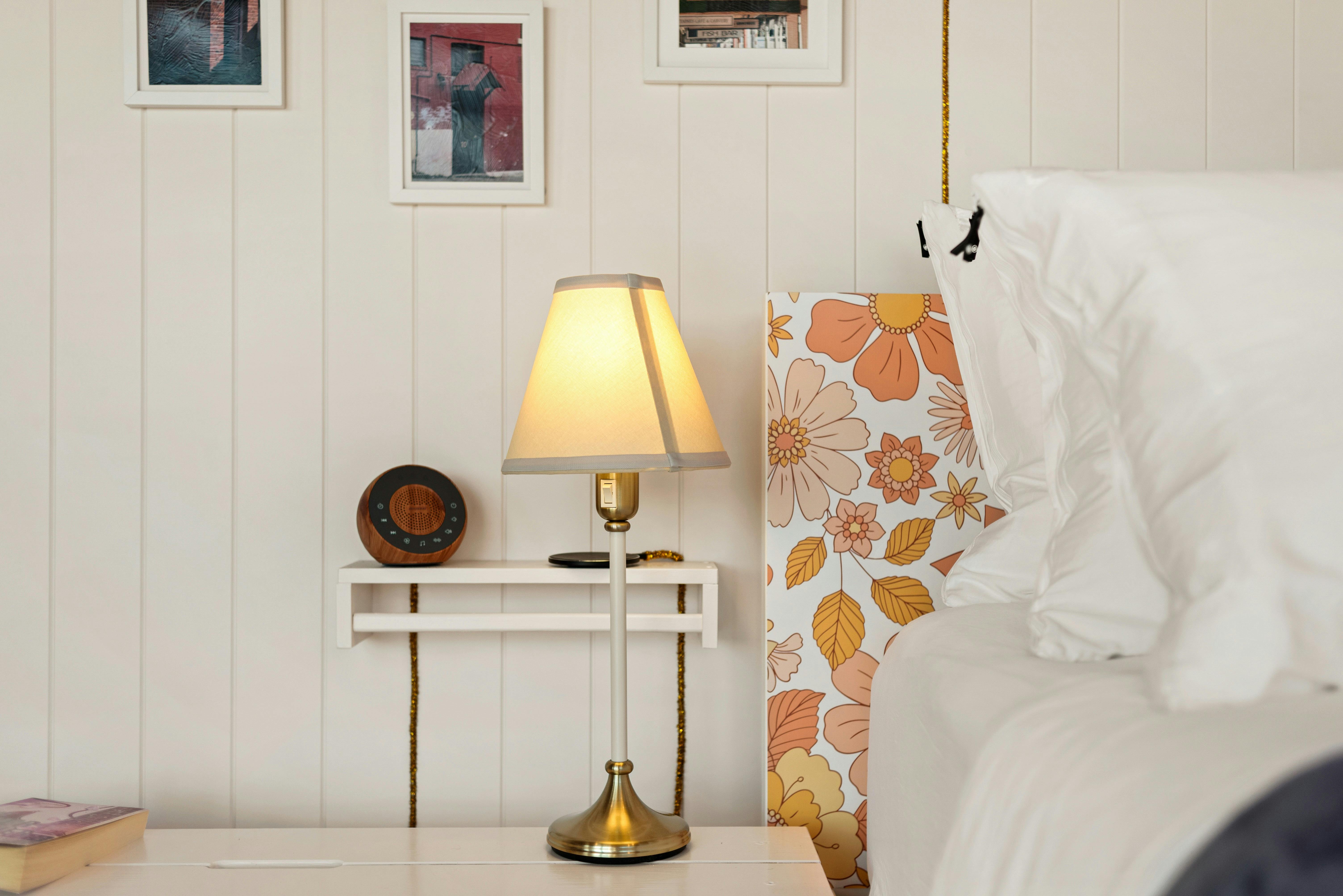 Bedside lamp, bedhead and pillows