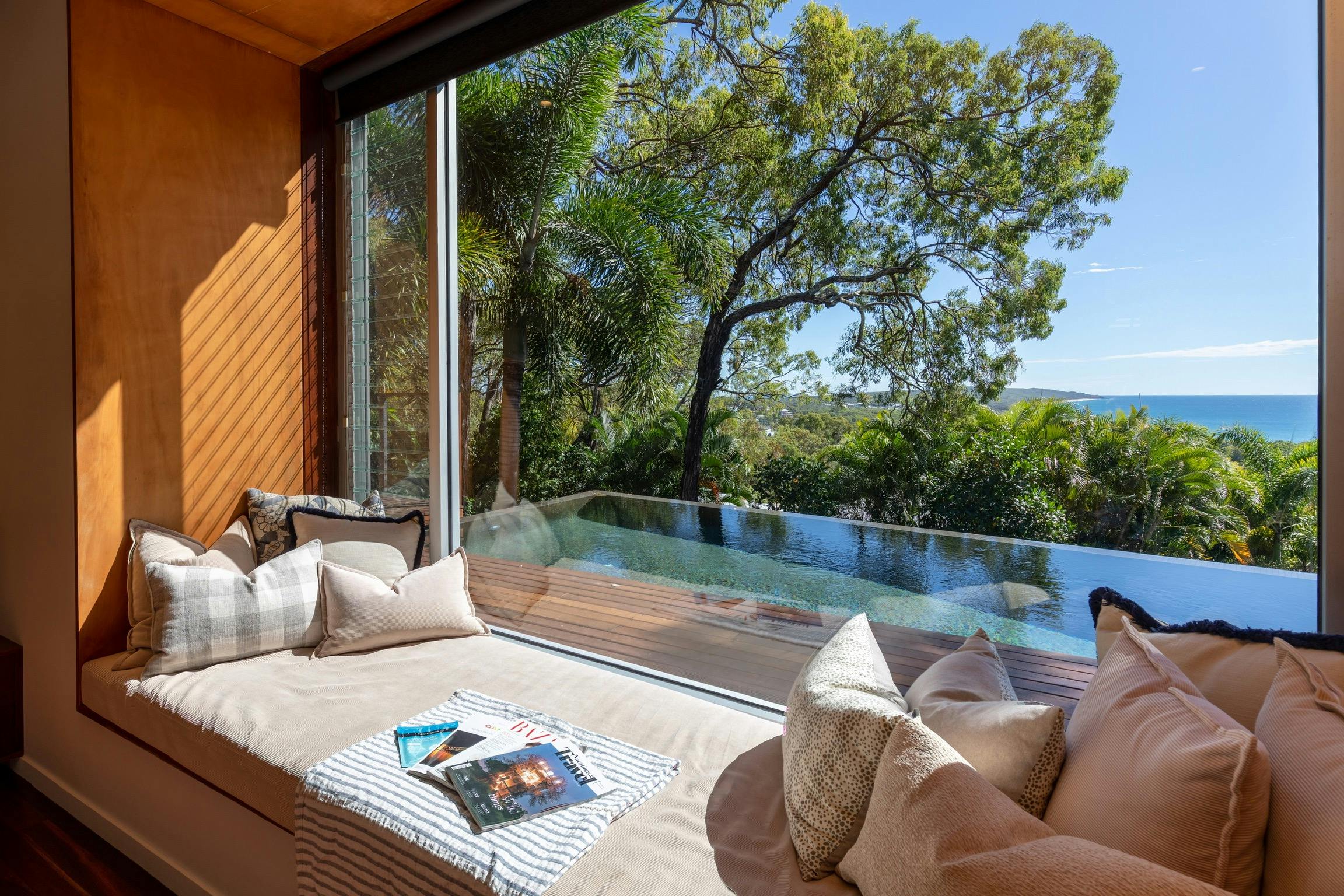Relax on the daybed looking over the infinity pool and spectacular view.